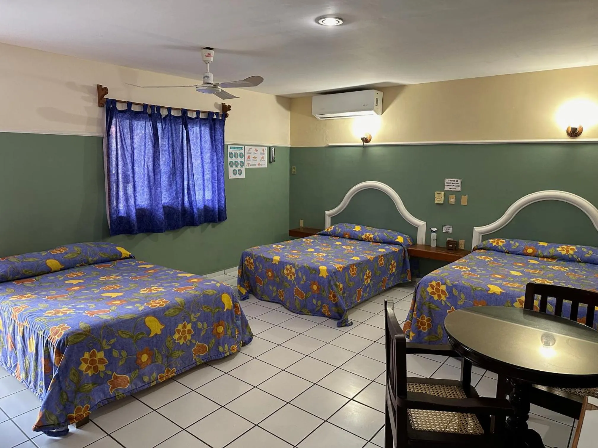 Bed in Blue Pacific Suites