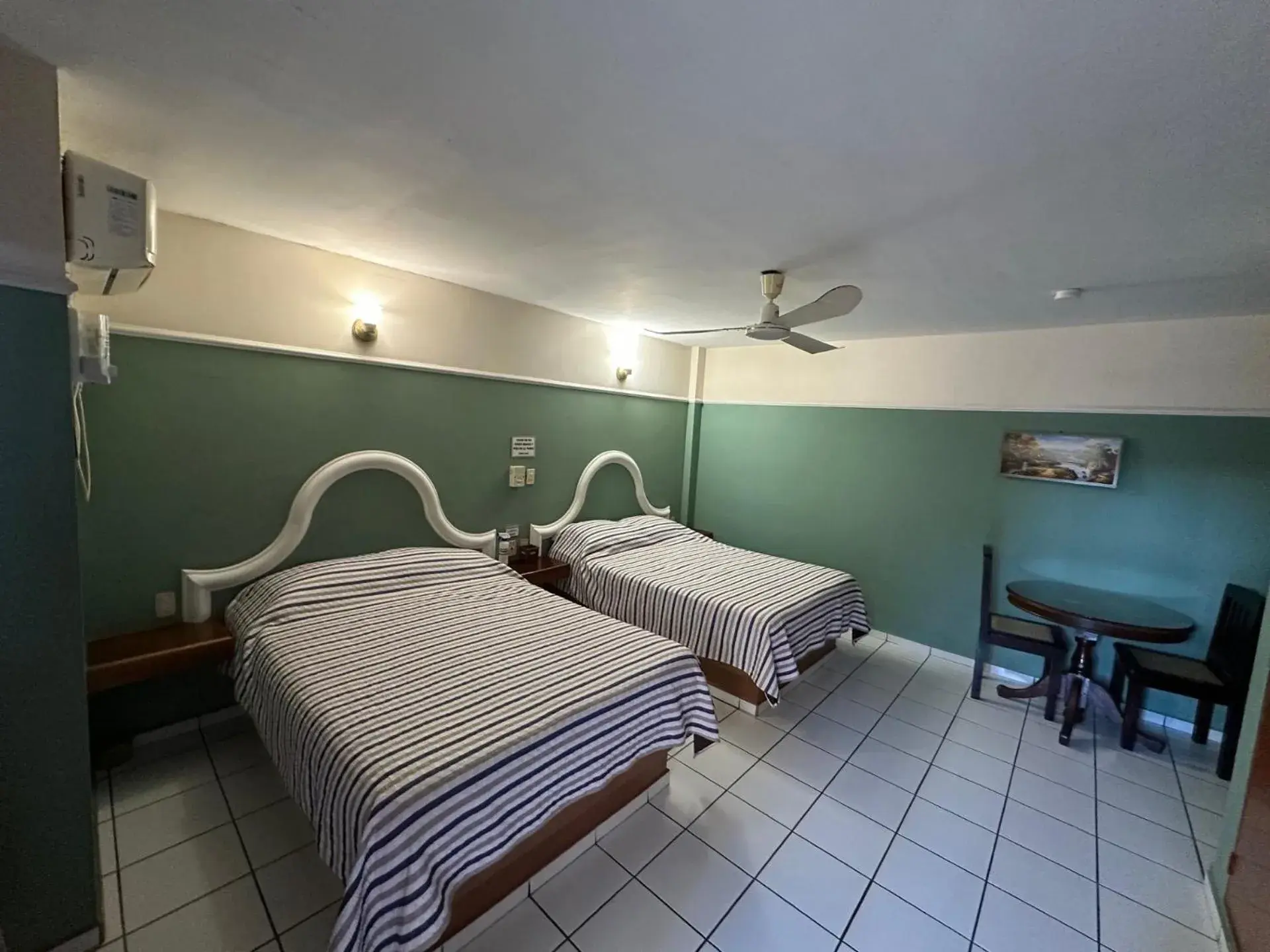 Double Room with Two Double Beds in Blue Pacific Suites Double Room with Two Double Beds in Blue Pacific Suites