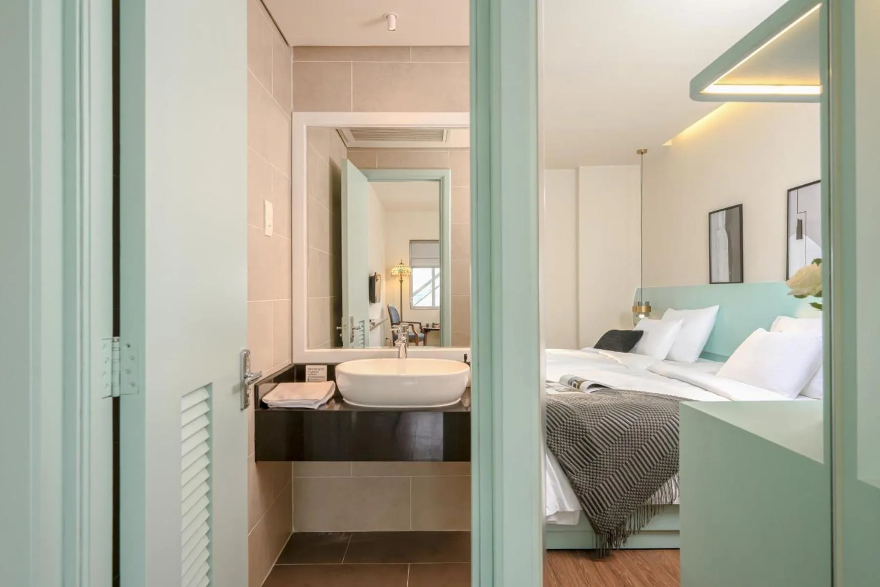 Bathroom, Bed in M Village Hotel Tao Đàn Park