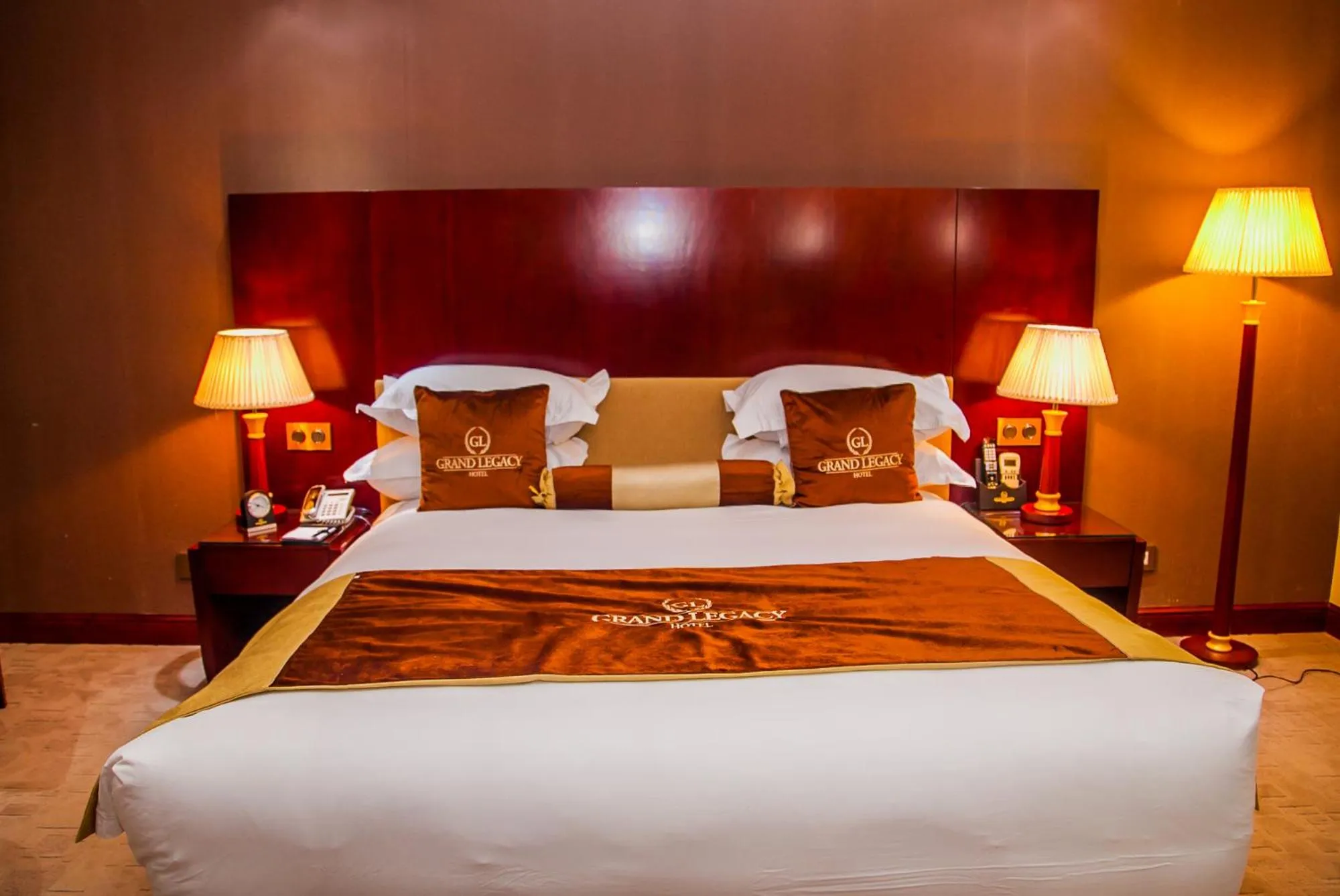 Bed in Grand Legacy Hotel
