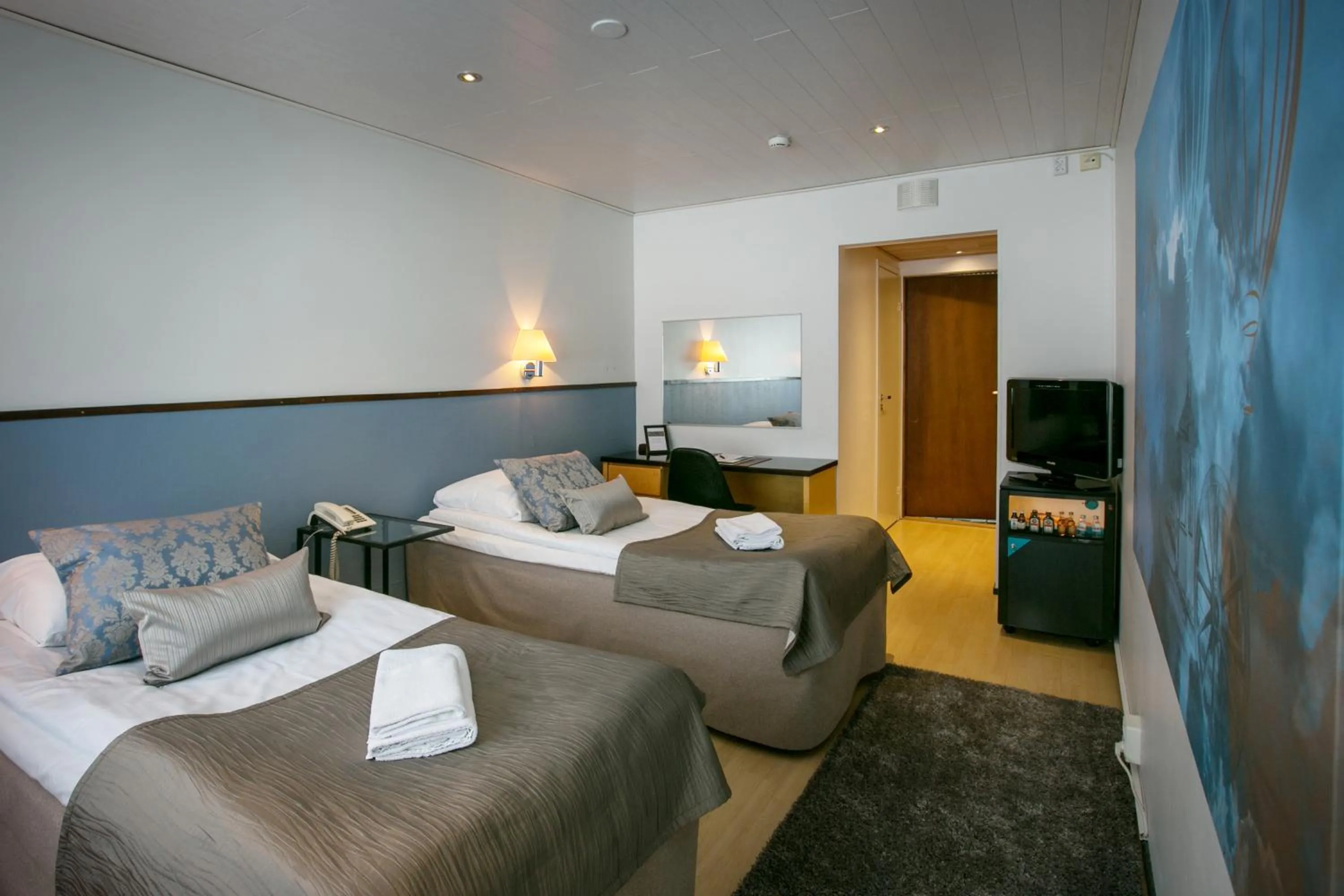 Photo of the whole room, Bed in Hotelli Gustavelund