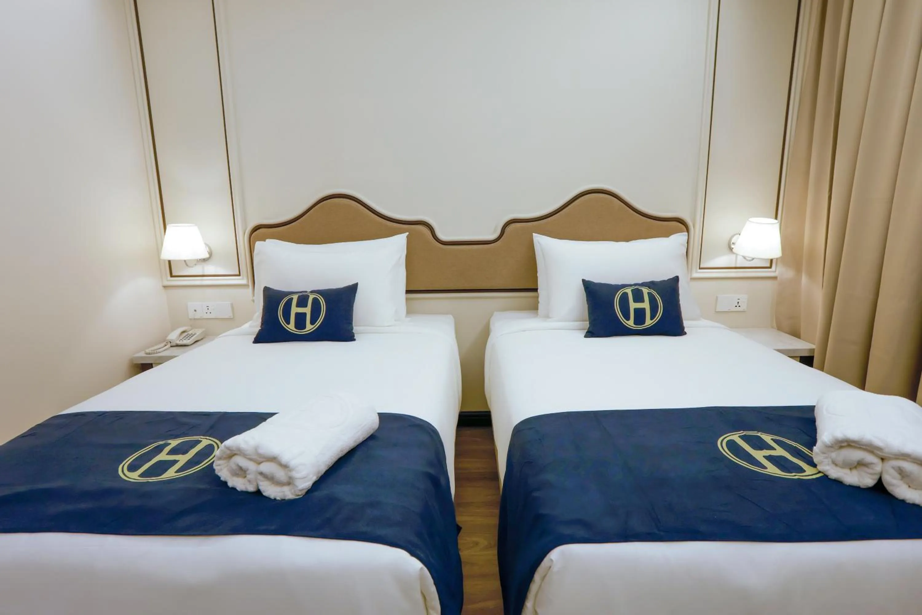 Bed in The Host Hotel