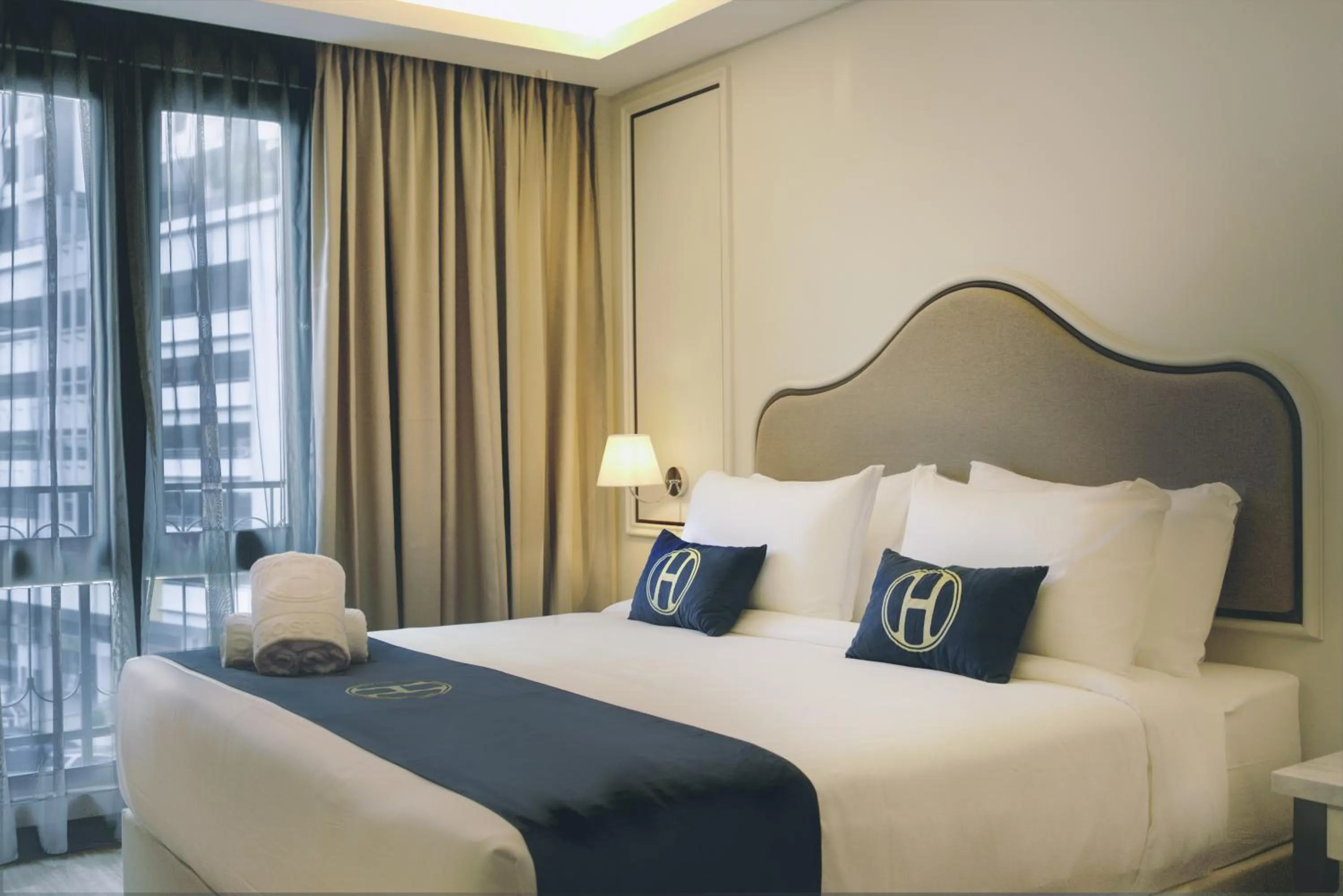 Bed in The Host Hotel