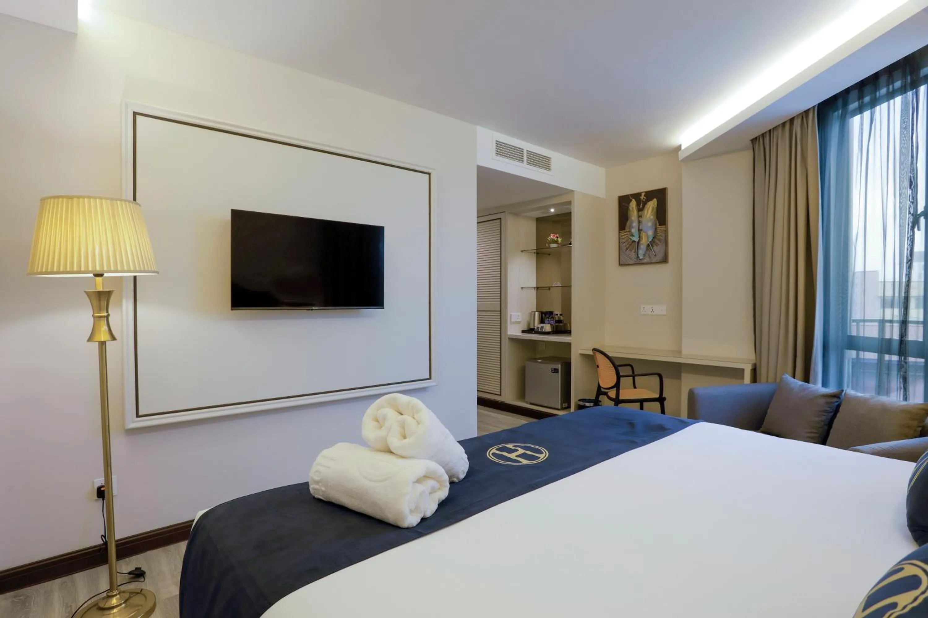 Bed in The Host Hotel