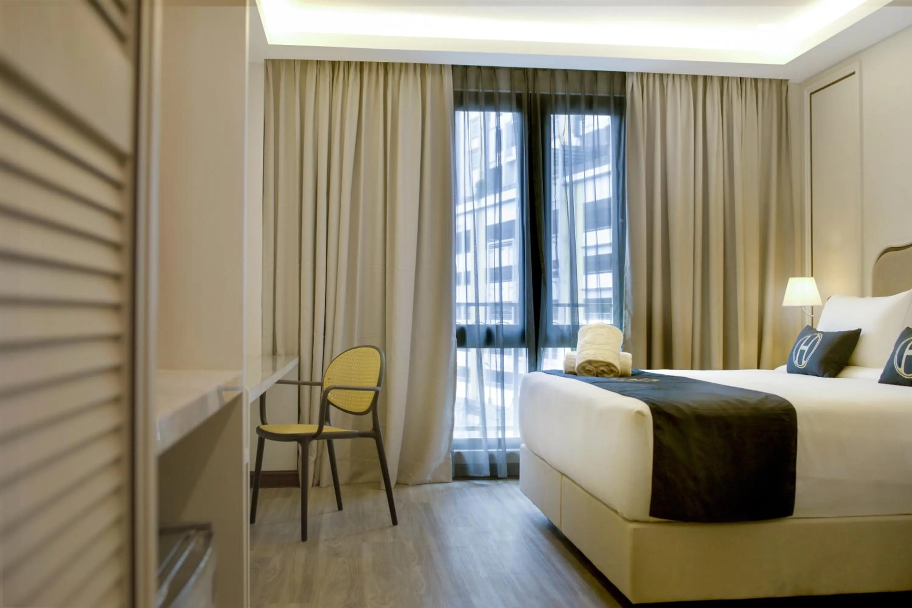 Photo of the whole room, Bed in The Host Hotel