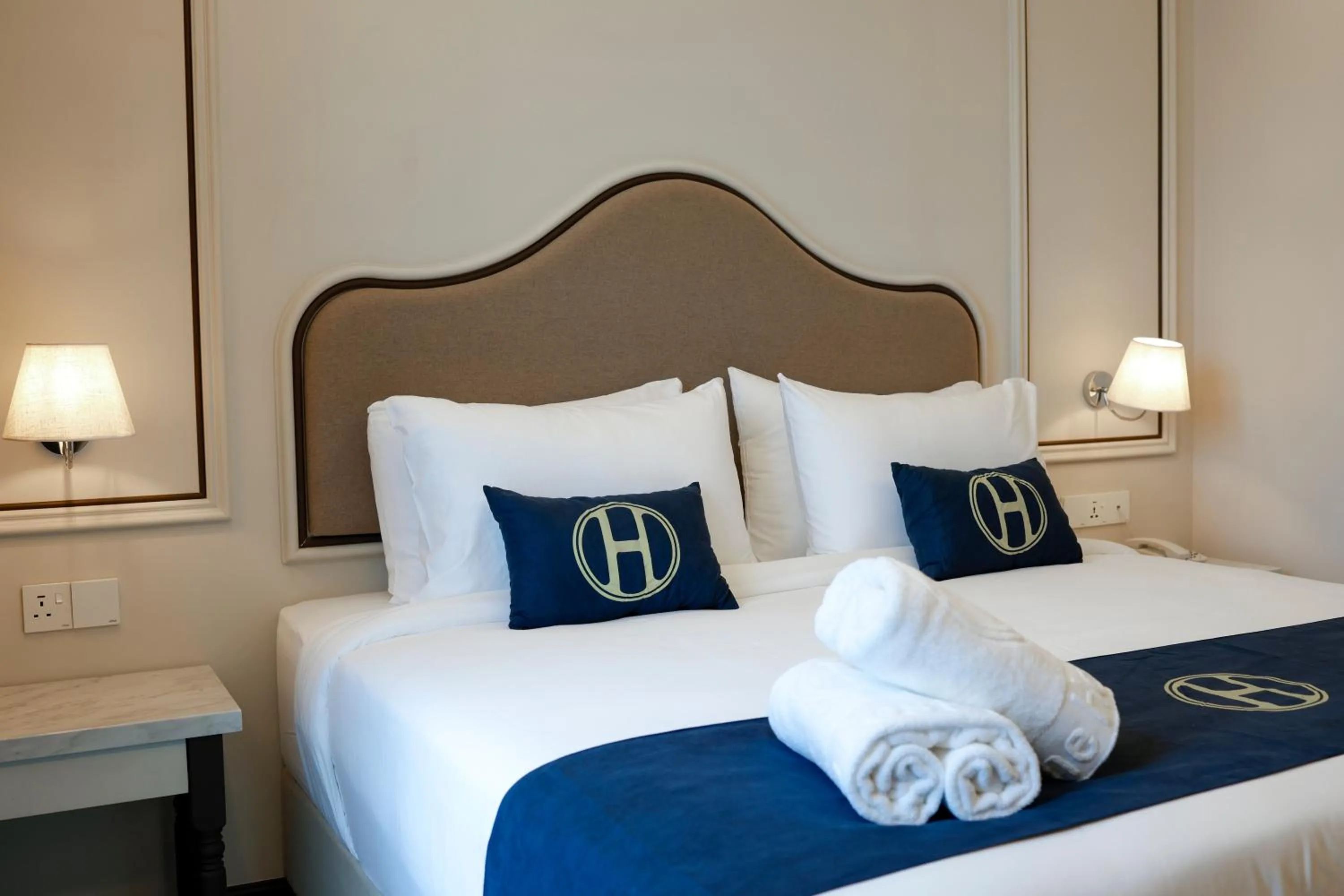 Bed in The Host Hotel