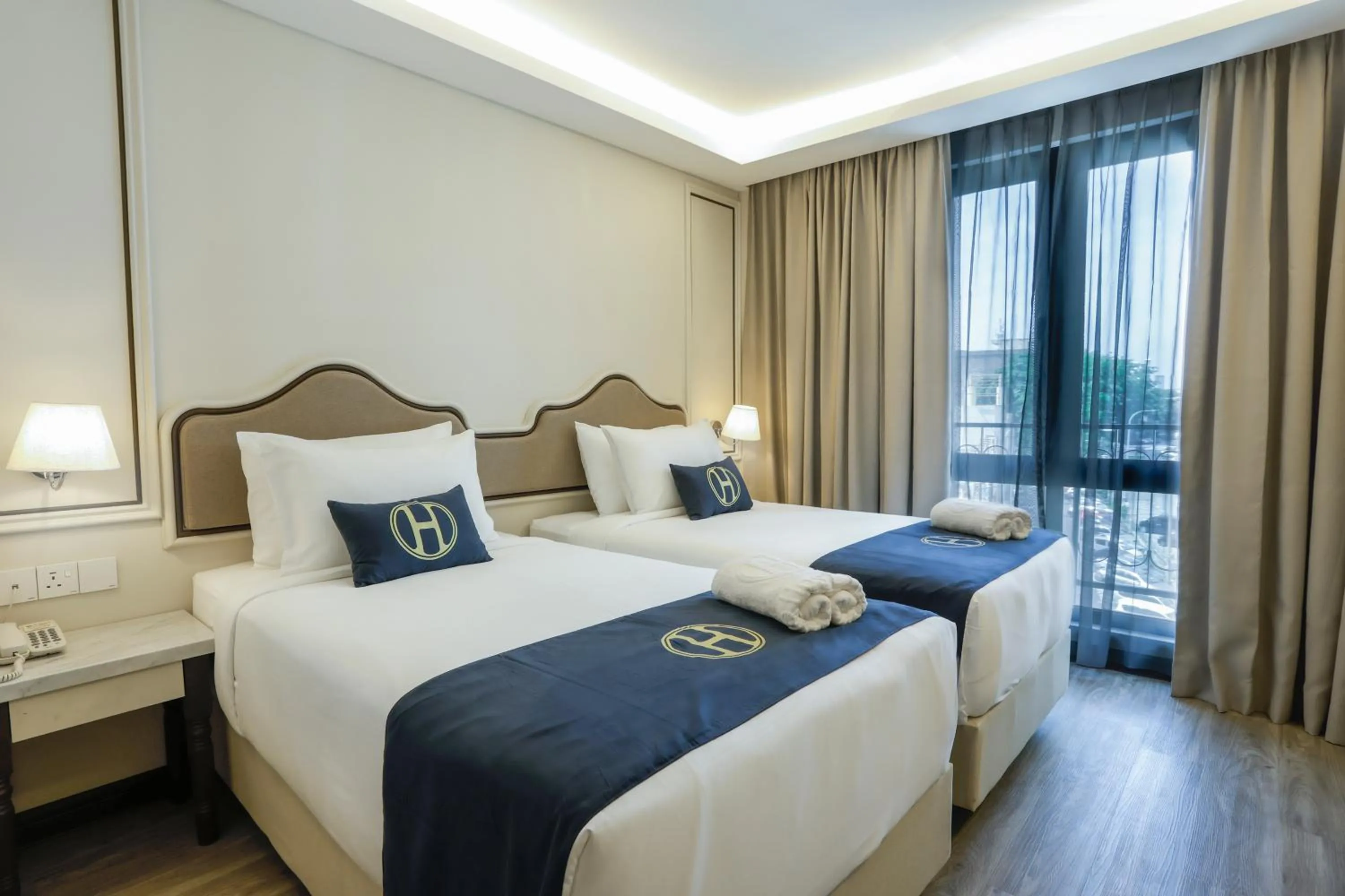 Bed in The Host Hotel