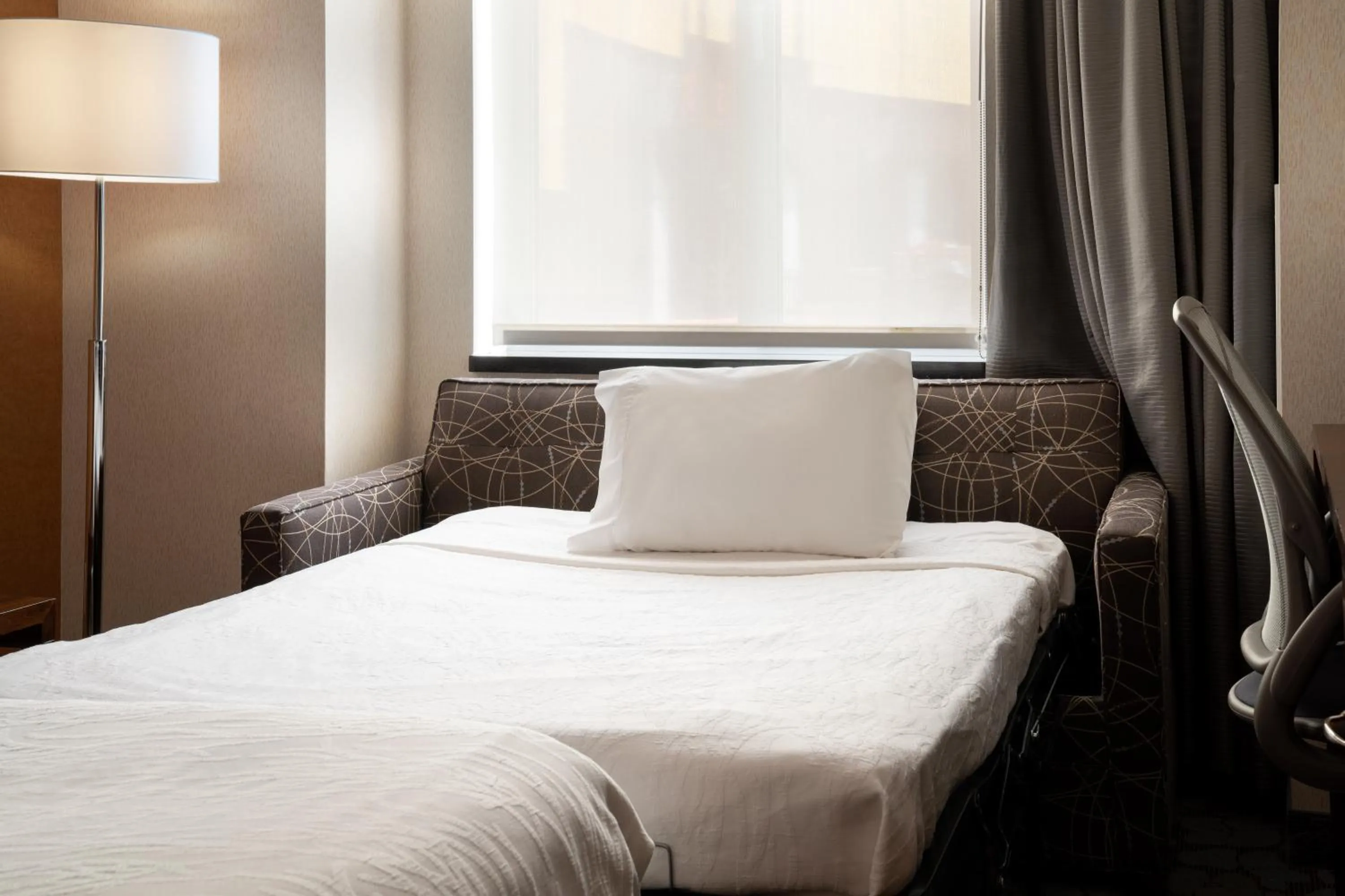 furniture, Bed in Hilton Garden Inn Long Island City