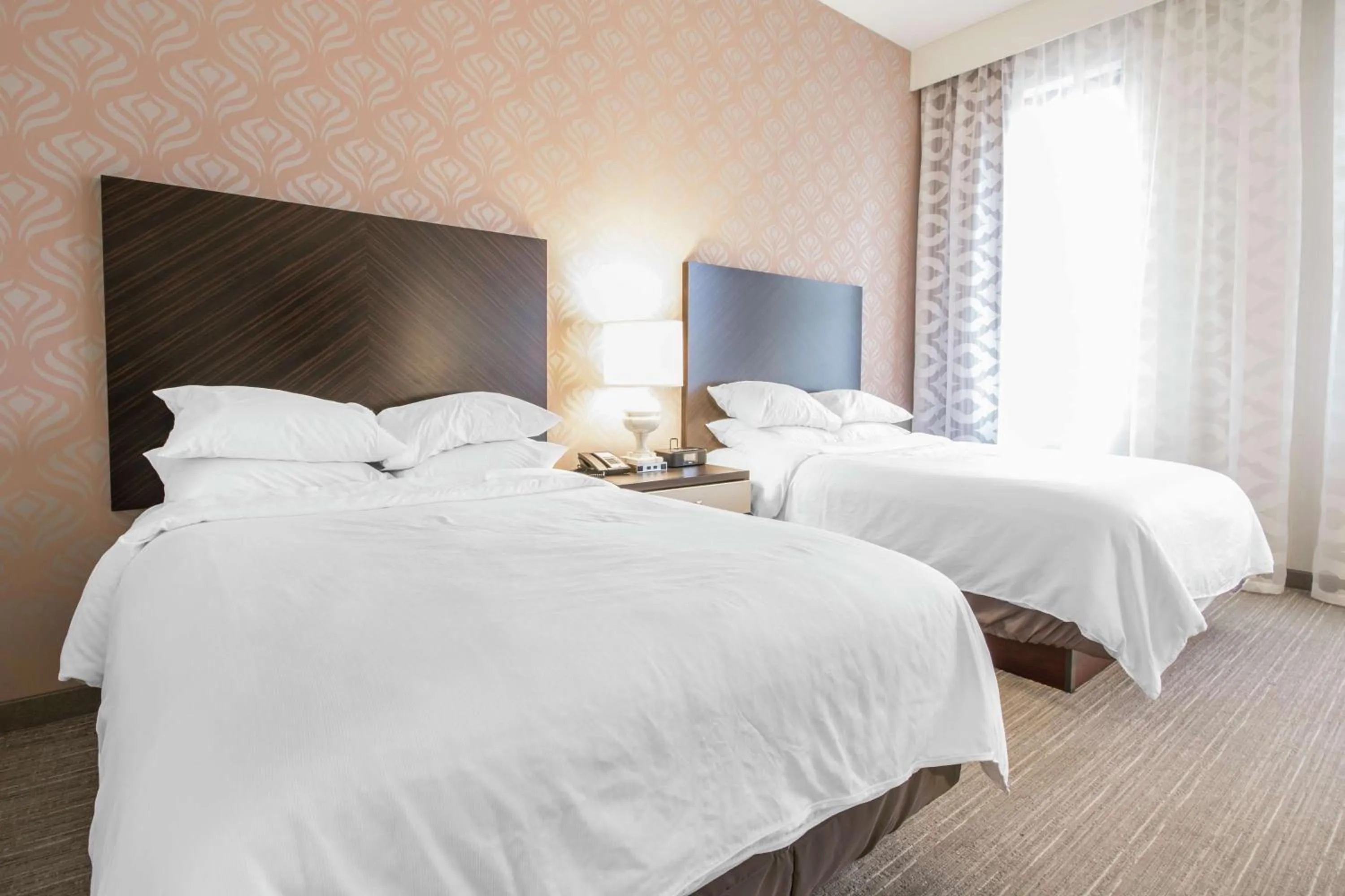 Bed in Embassy Suites Louisville Downtown