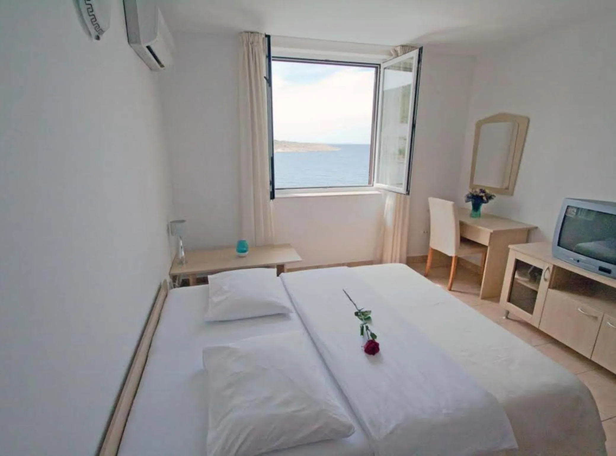 Bedroom in Beachfront Apartments Tamarix