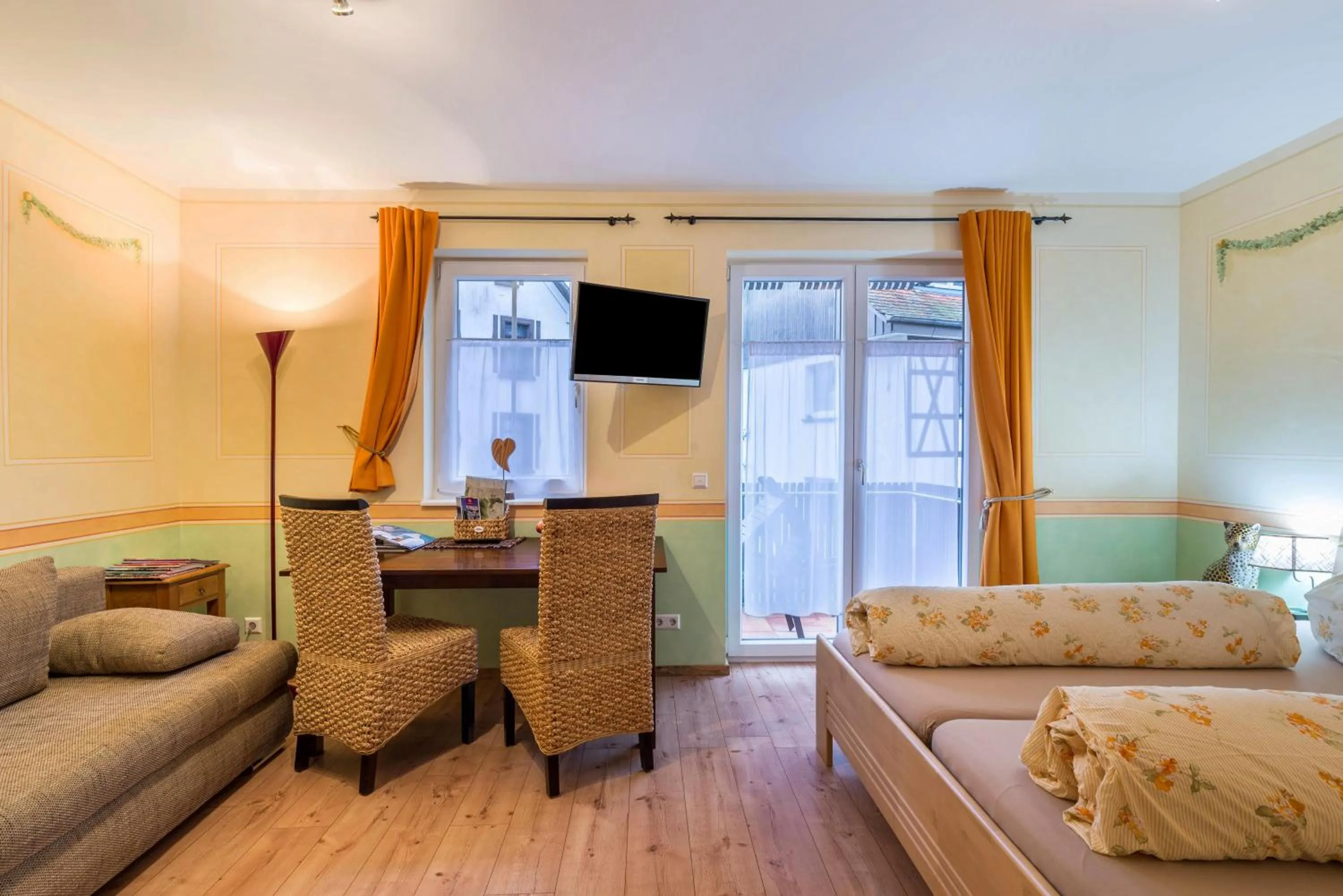 Bed in SCHUSTERjunge Aparthotel