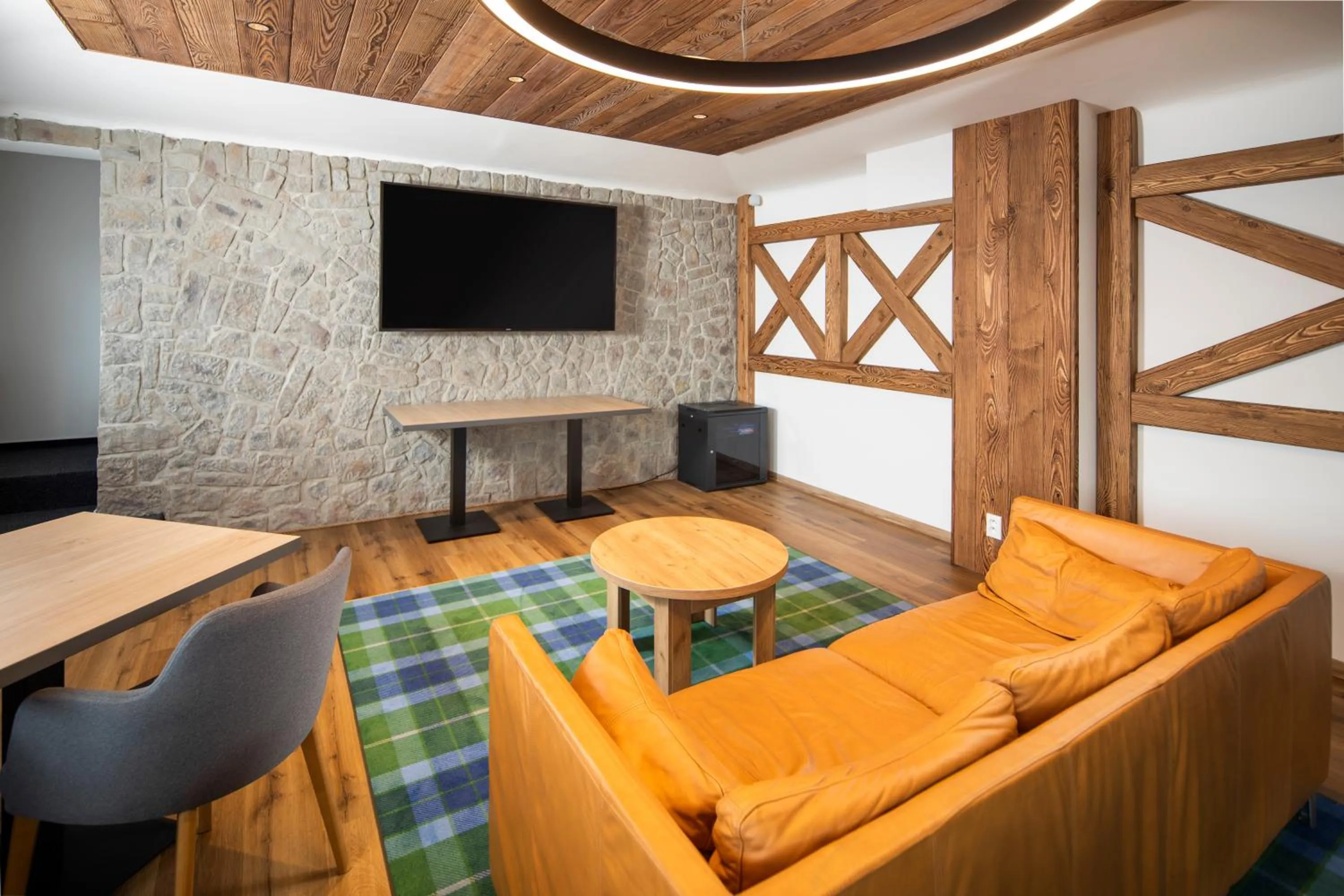 Communal lounge/ TV room in Hotel Granit Smrekovica