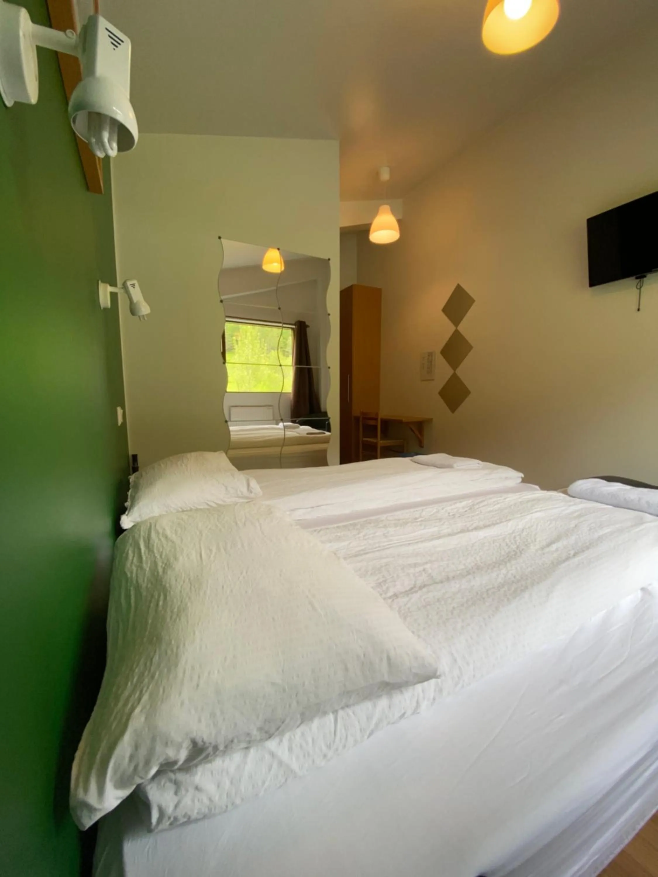 Bed in Hörgsland Guesthouse