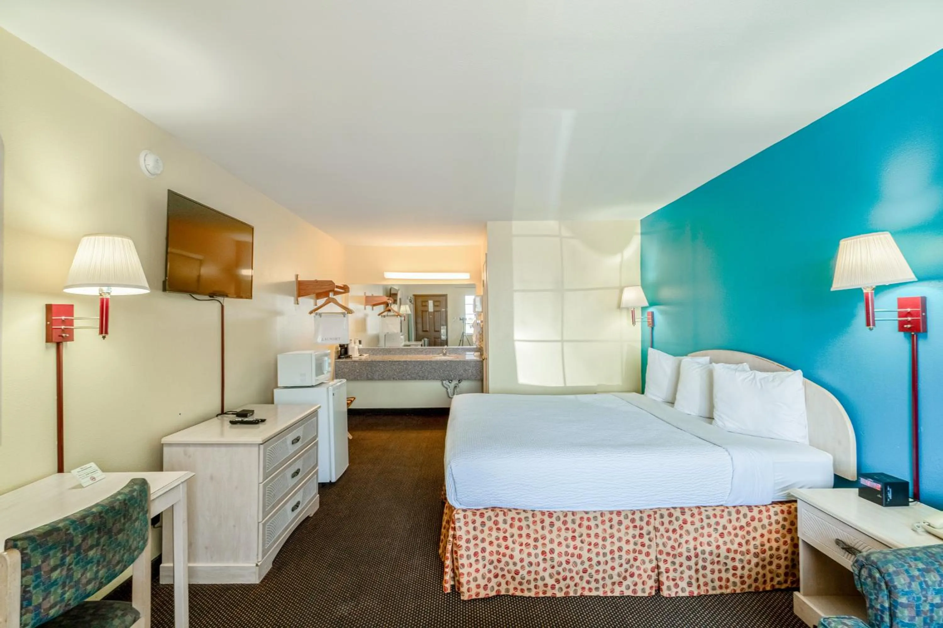 Bedroom, Bed in Shale Inn Andrews by OYO