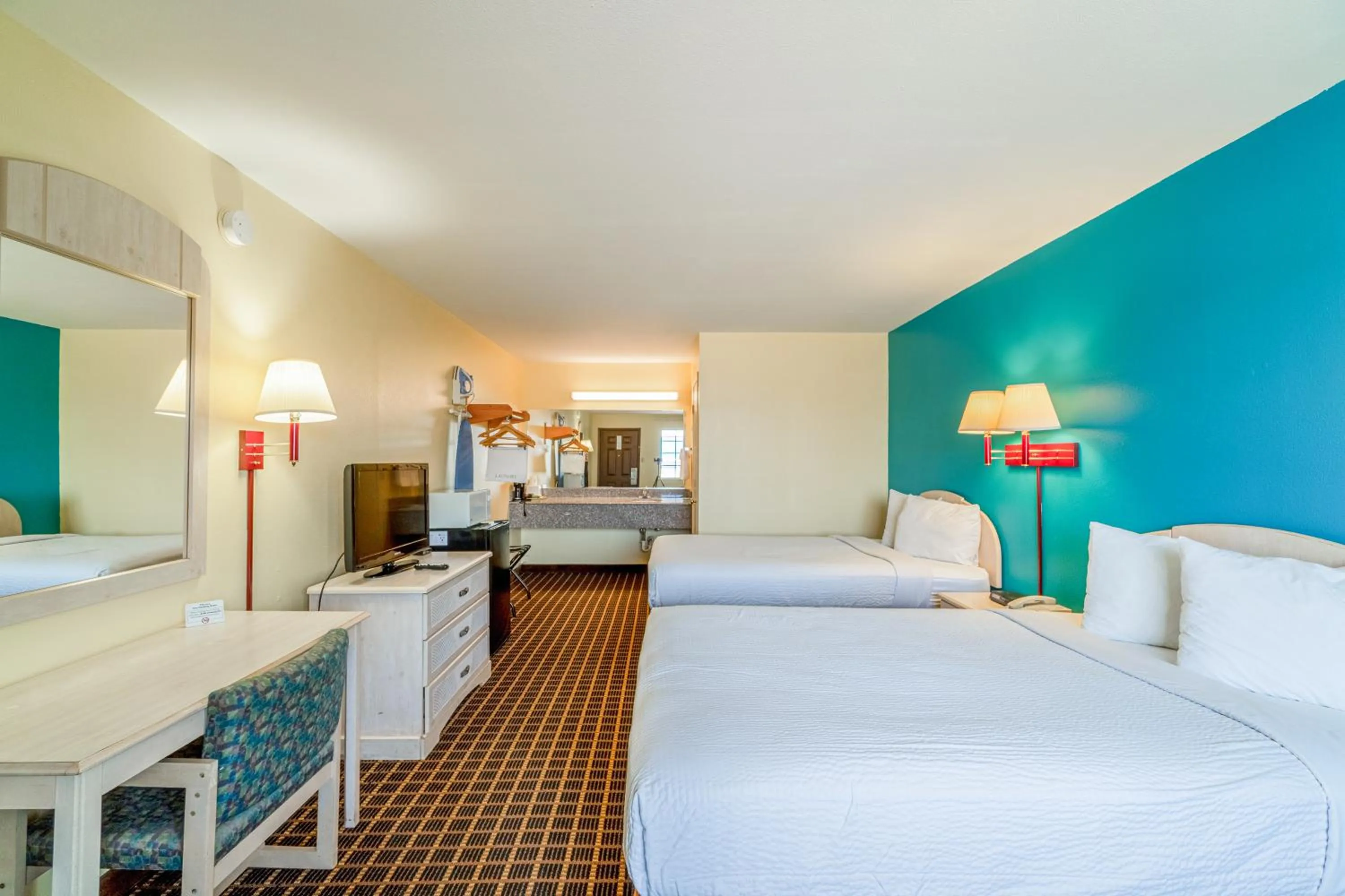 Bedroom, Bed in Shale Inn Andrews by OYO