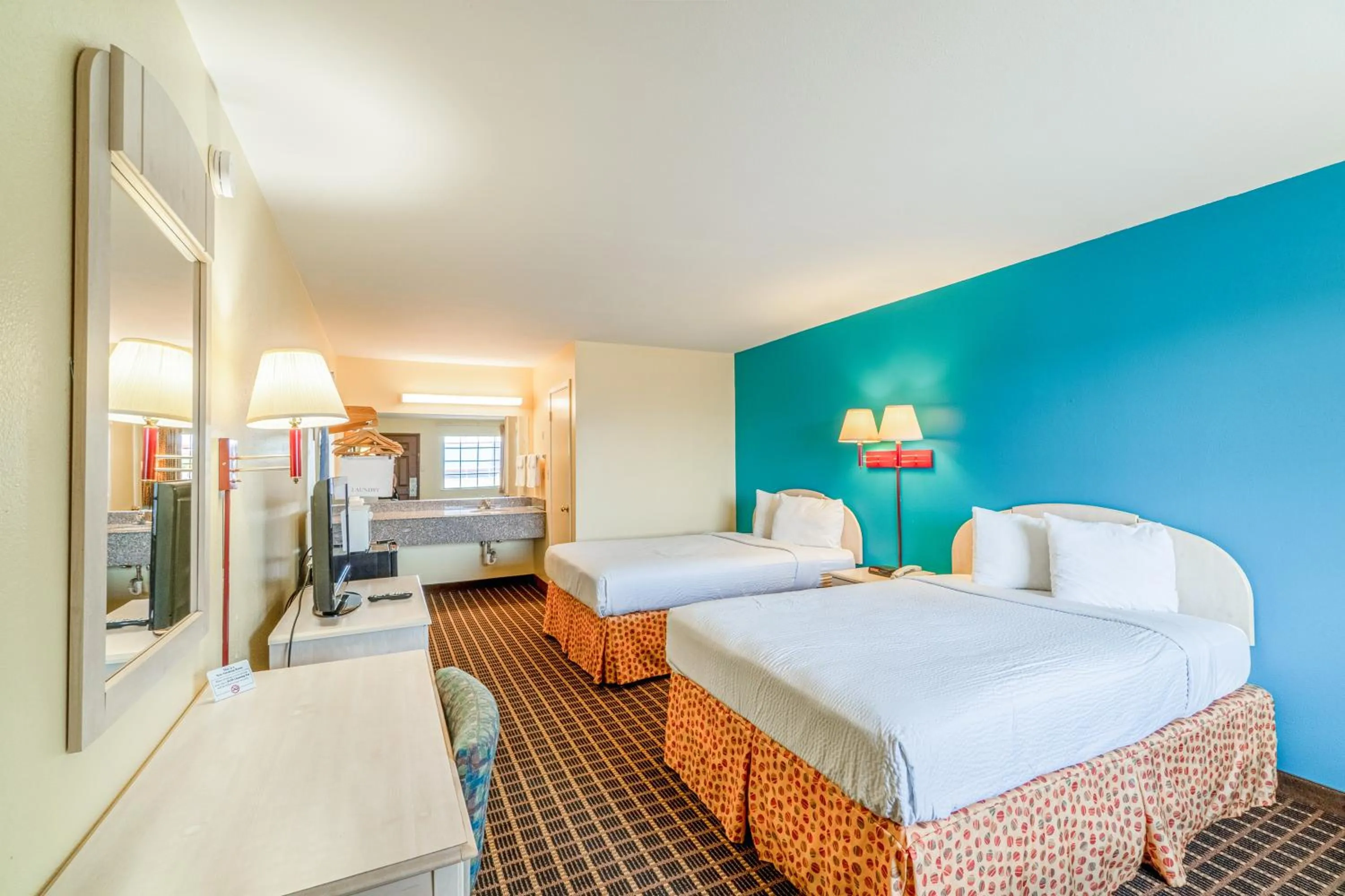 Bedroom, Bed in Shale Inn Andrews by OYO