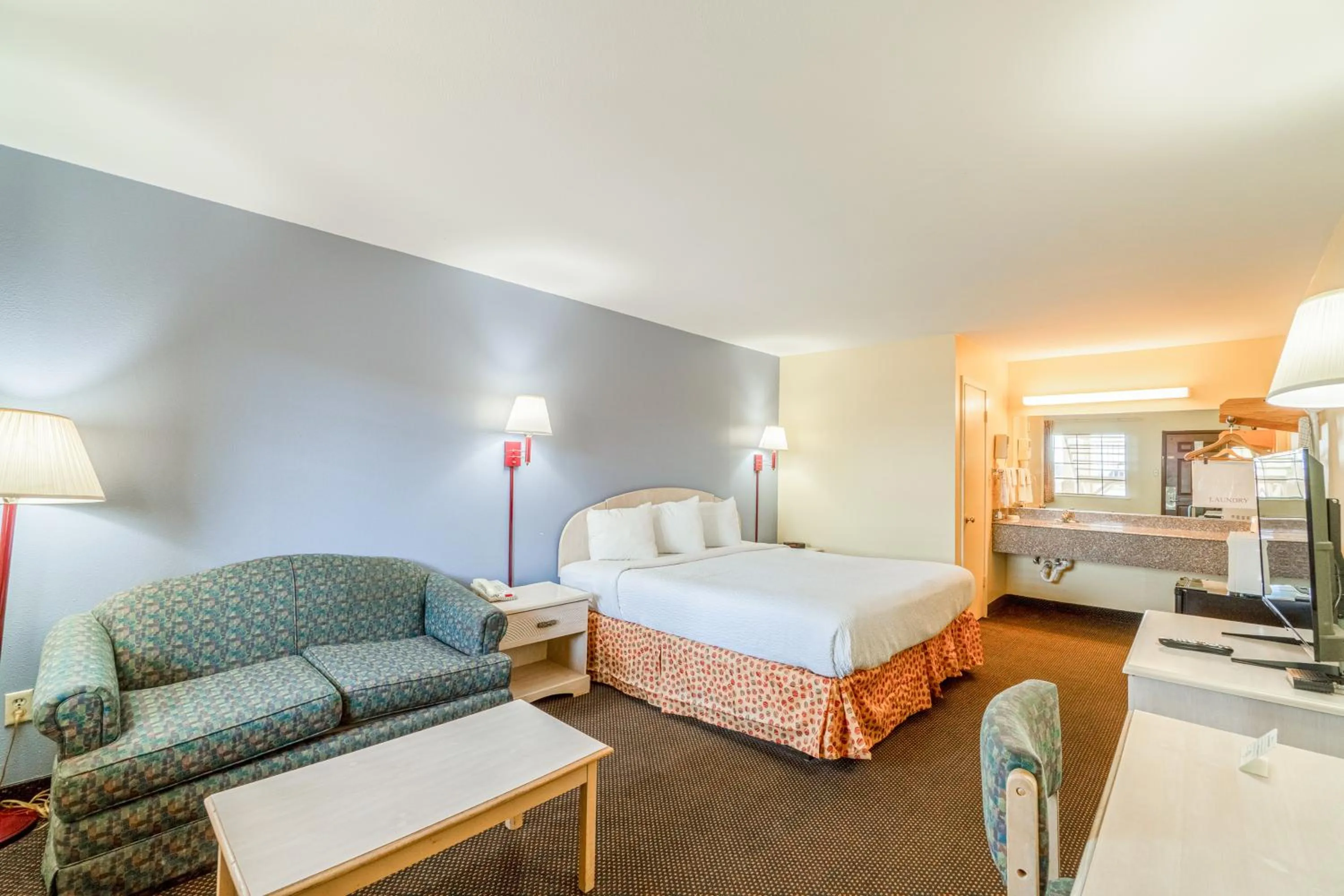 Bedroom, Bed in Shale Inn Andrews by OYO