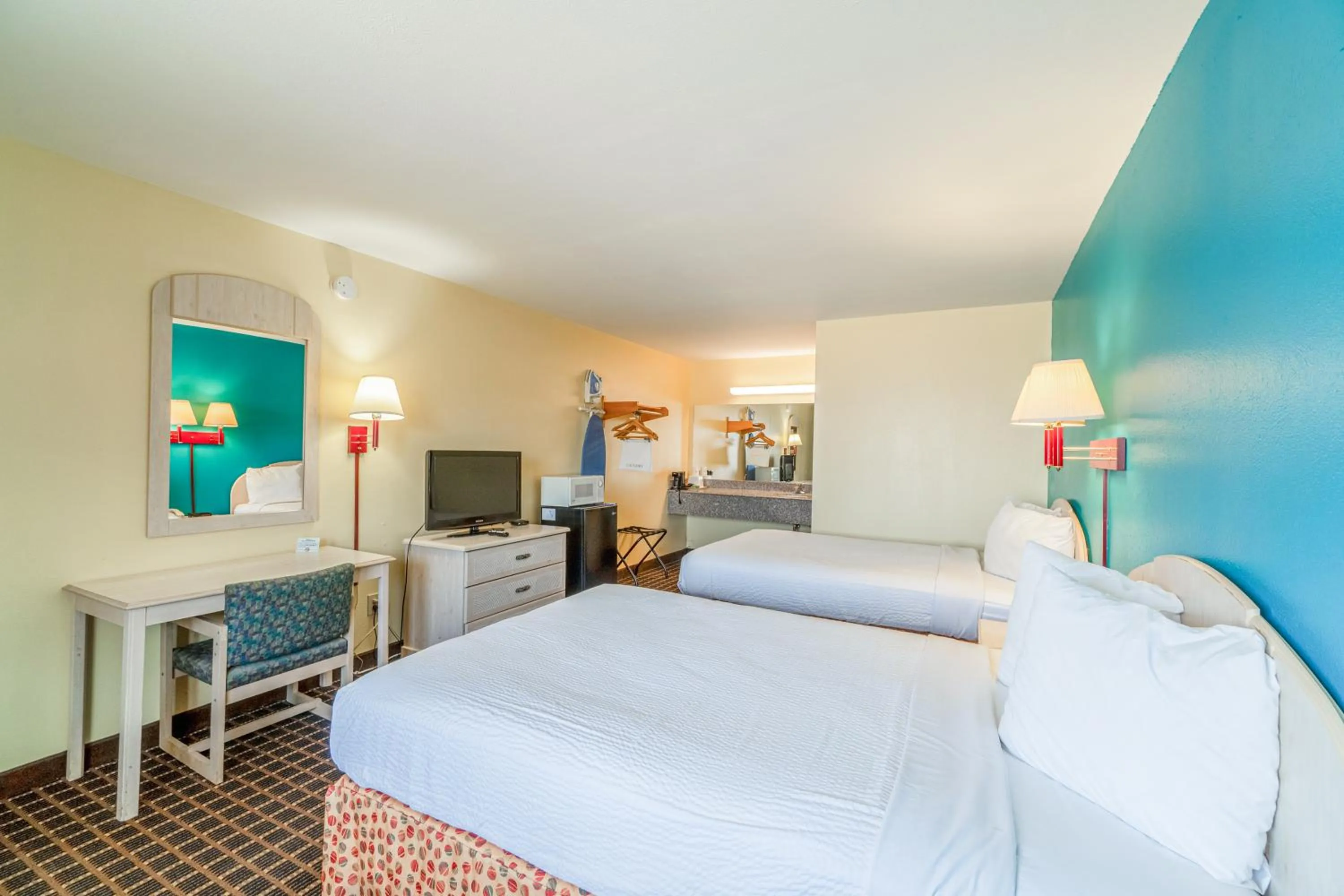 Bedroom, Bed in Shale Inn Andrews by OYO