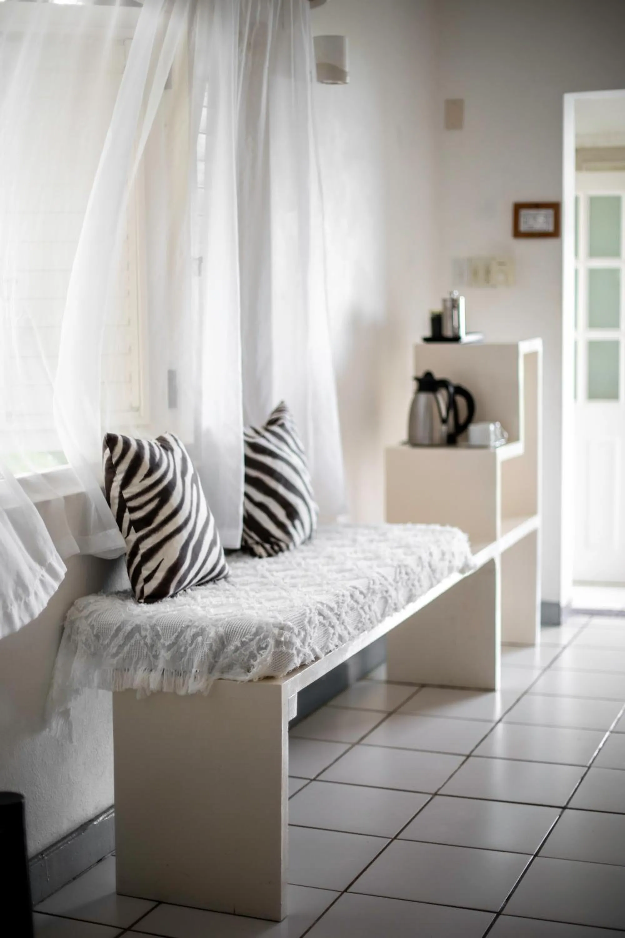 Seating area, Bed in LF Jungle Retreat