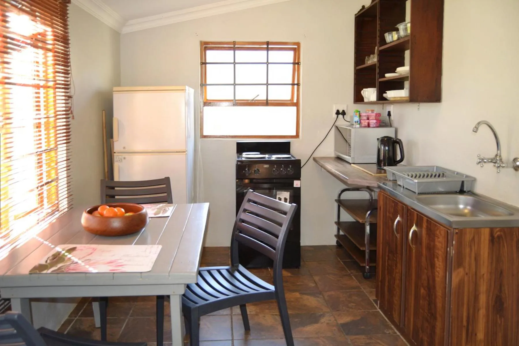 Kitchen or kitchenette in Sandy's Place