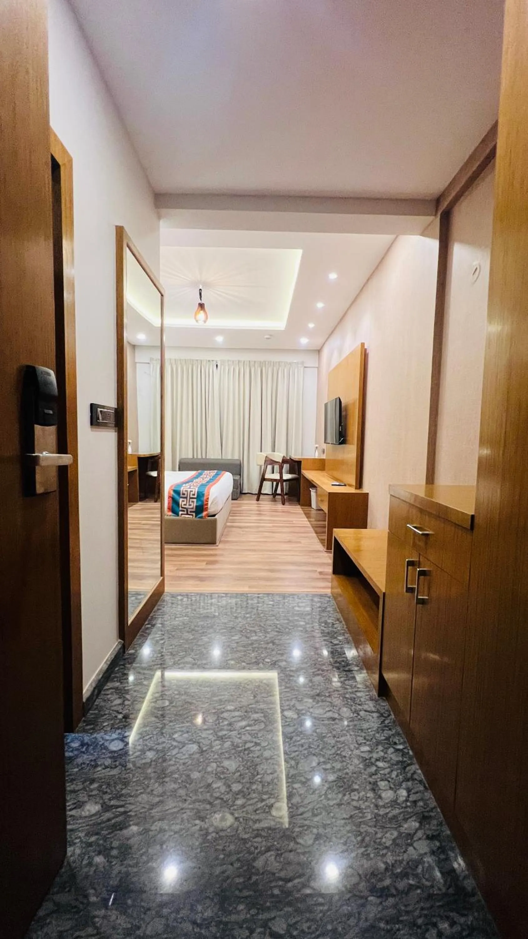 Bed in Hotel Aashraya