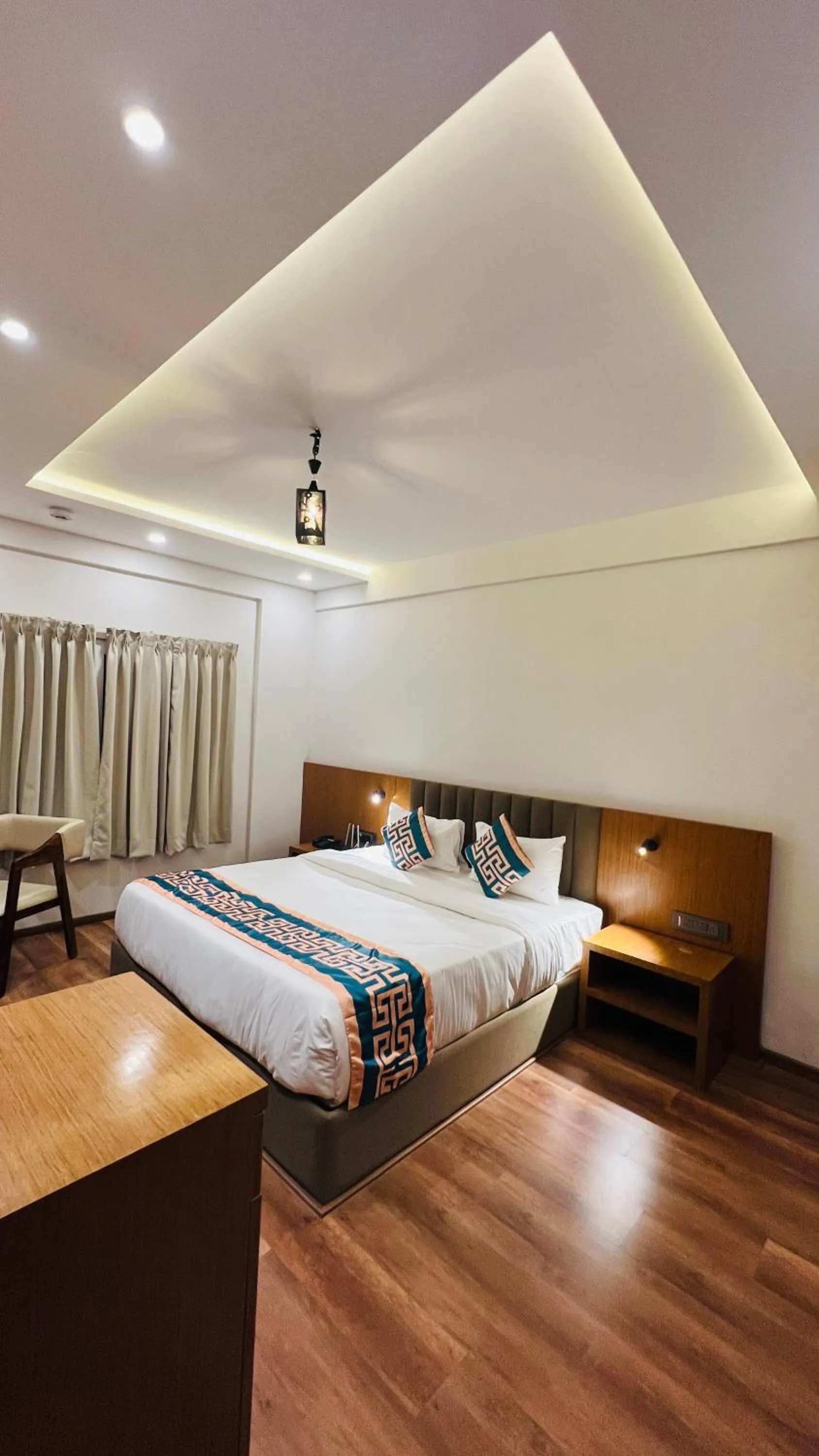 Bed in Hotel Aashraya