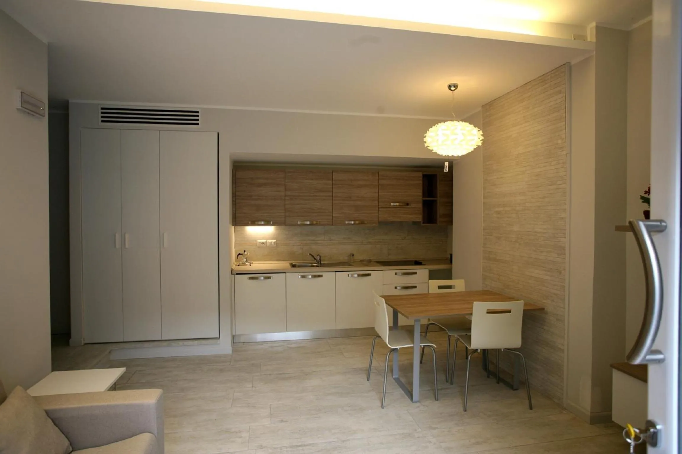 Kitchen or kitchenette in Nina Casa Vacanze