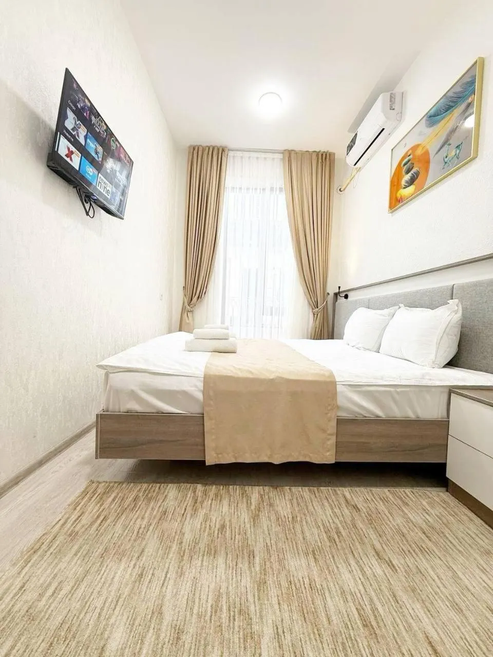 Communal lounge/ TV room, Bed in SADI Hotel