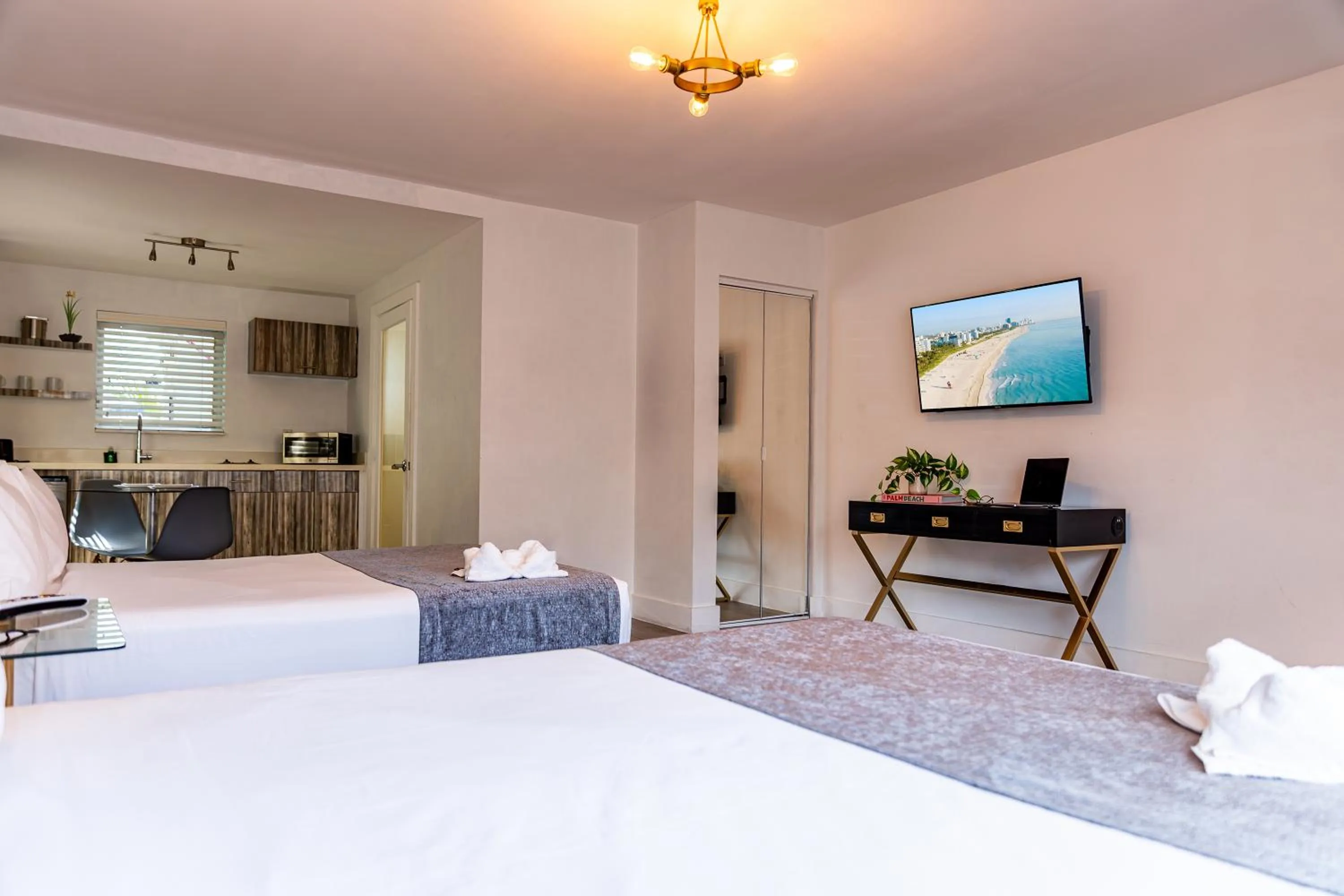 Bed in Beachside All Suites Hotel