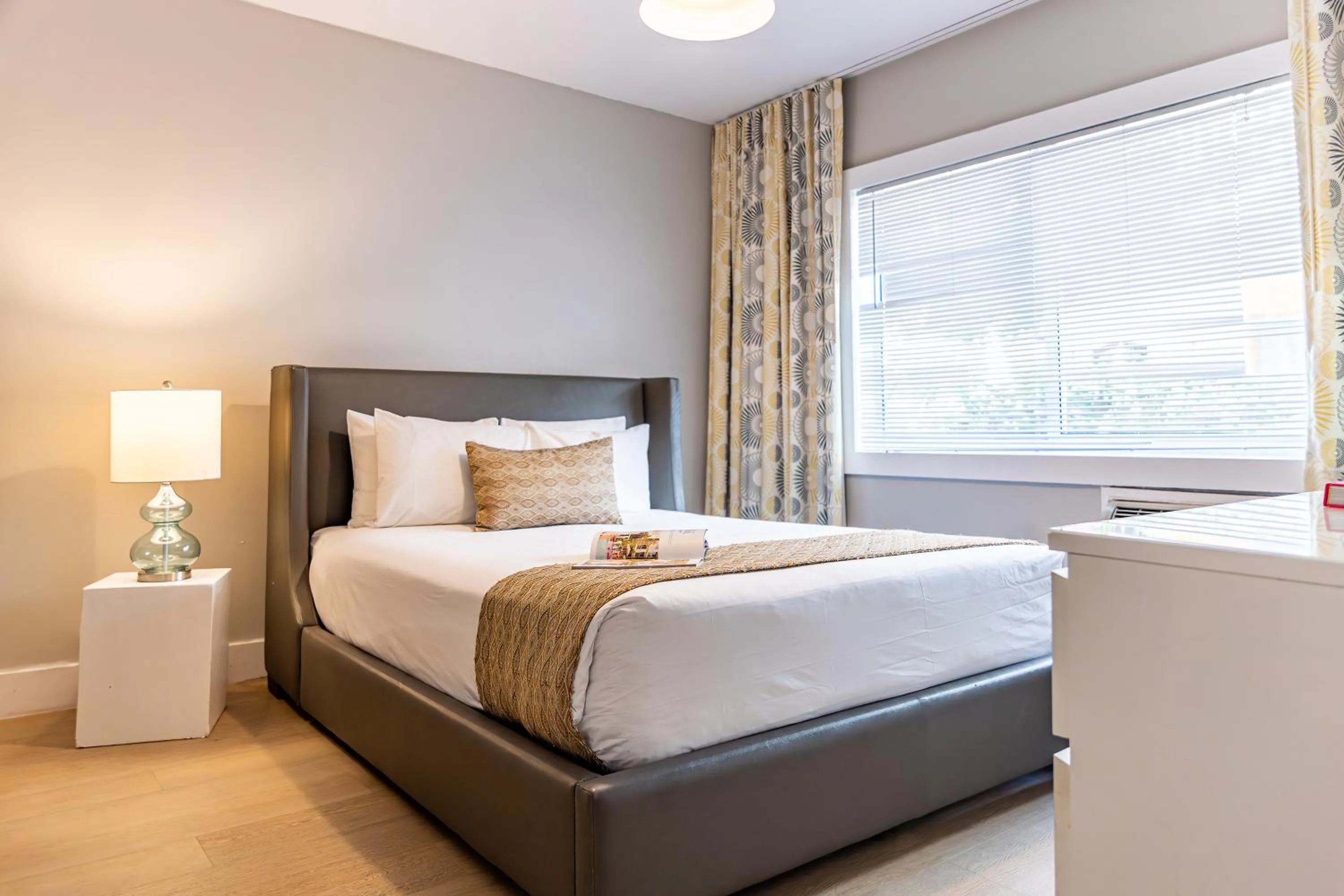 Bed in Beachside All Suites Hotel