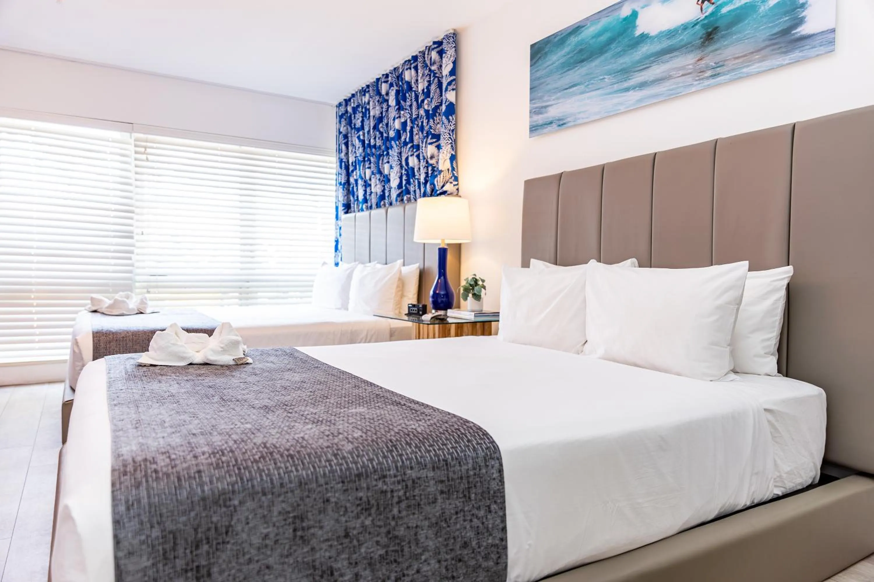 Bed in Beachside All Suites Hotel