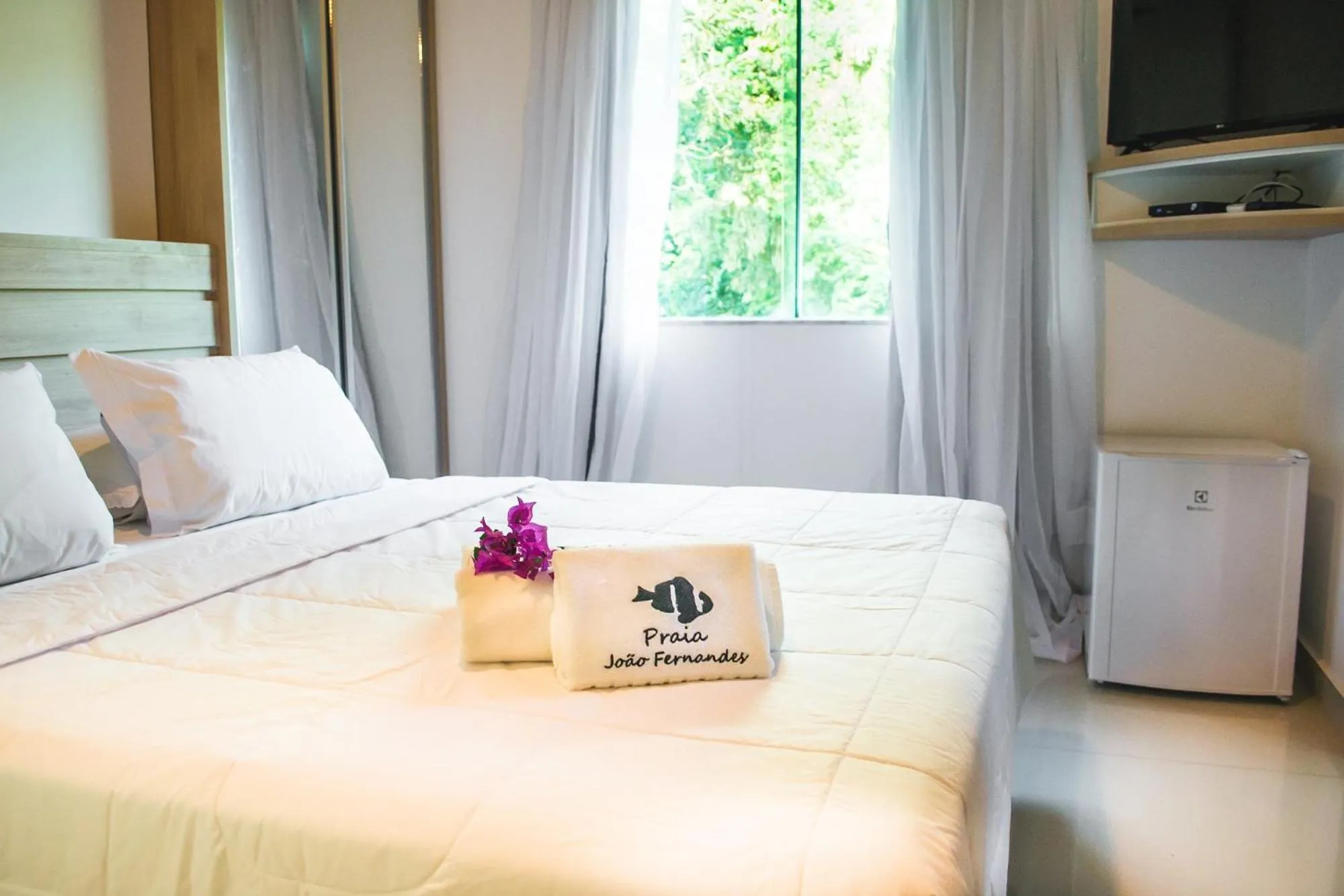 Bed in Pousada Praia João Fernandes