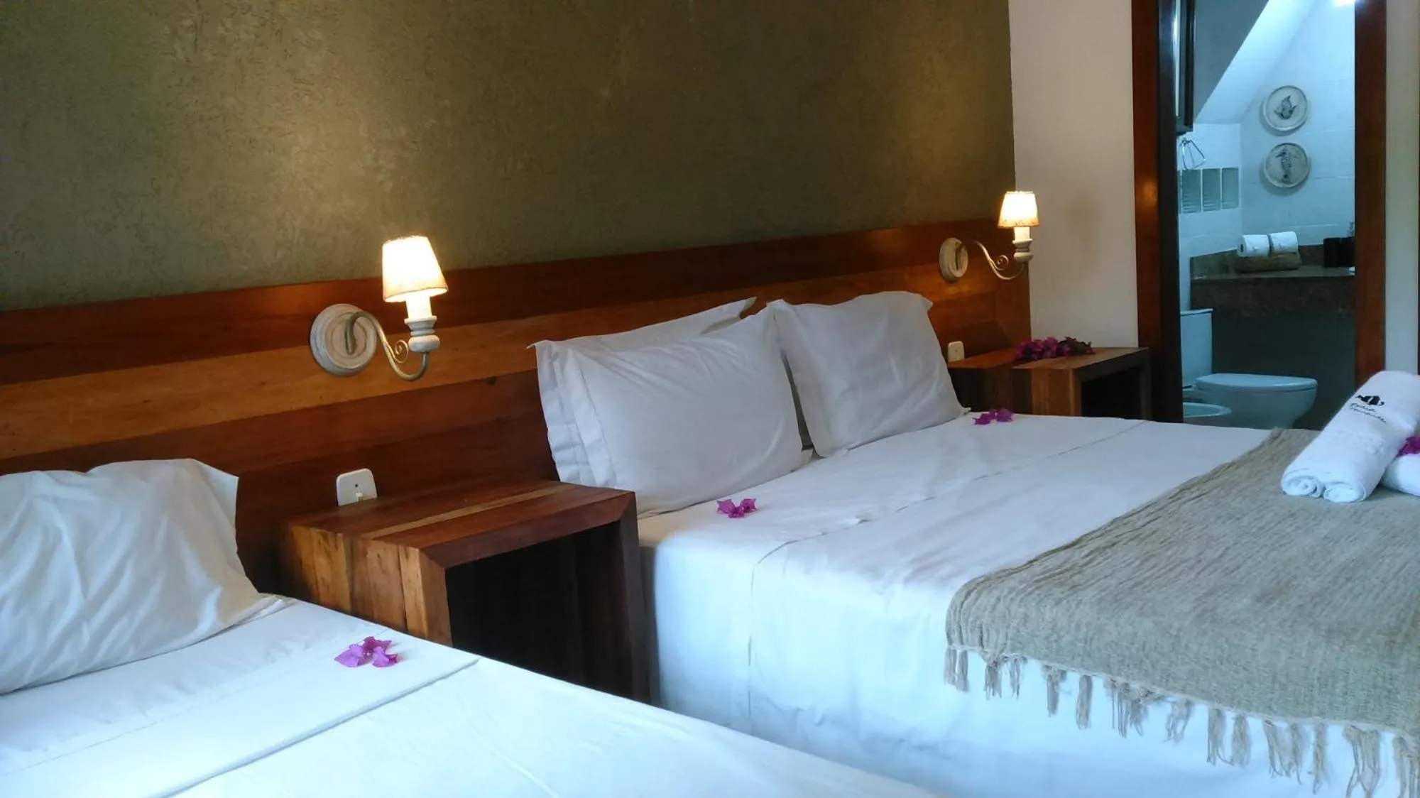 Bed in Pousada Praia João Fernandes