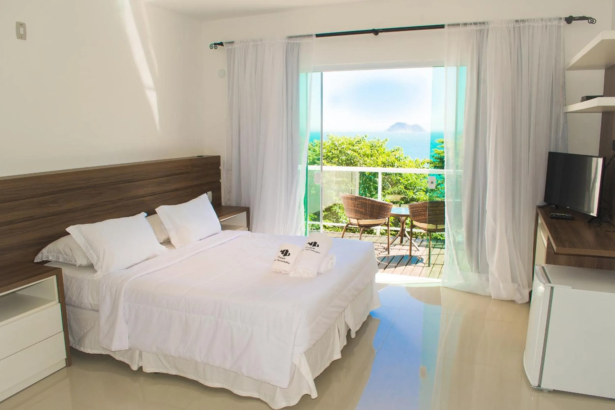 Bed in Pousada Praia João Fernandes