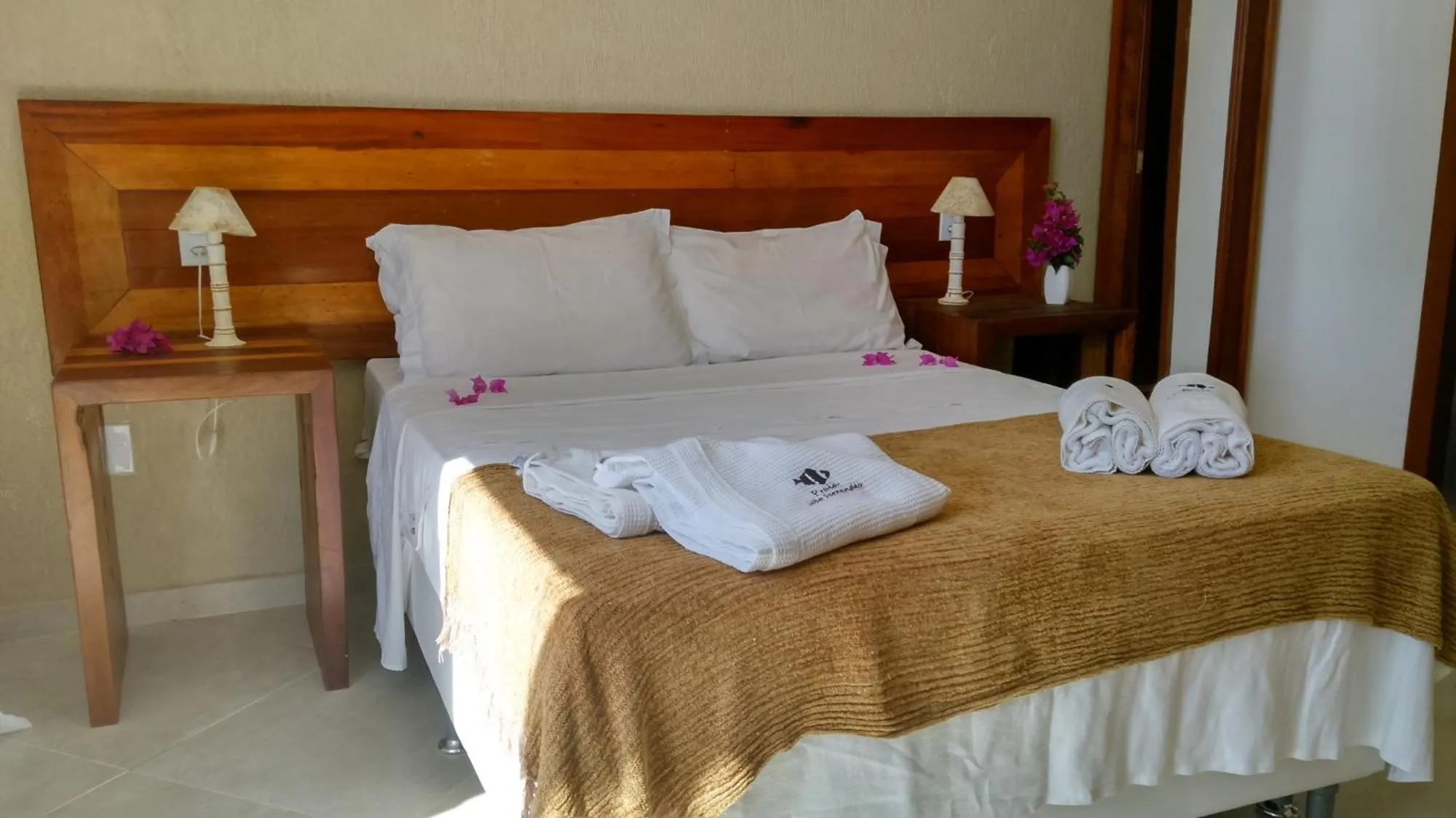 Bed in Pousada Praia João Fernandes