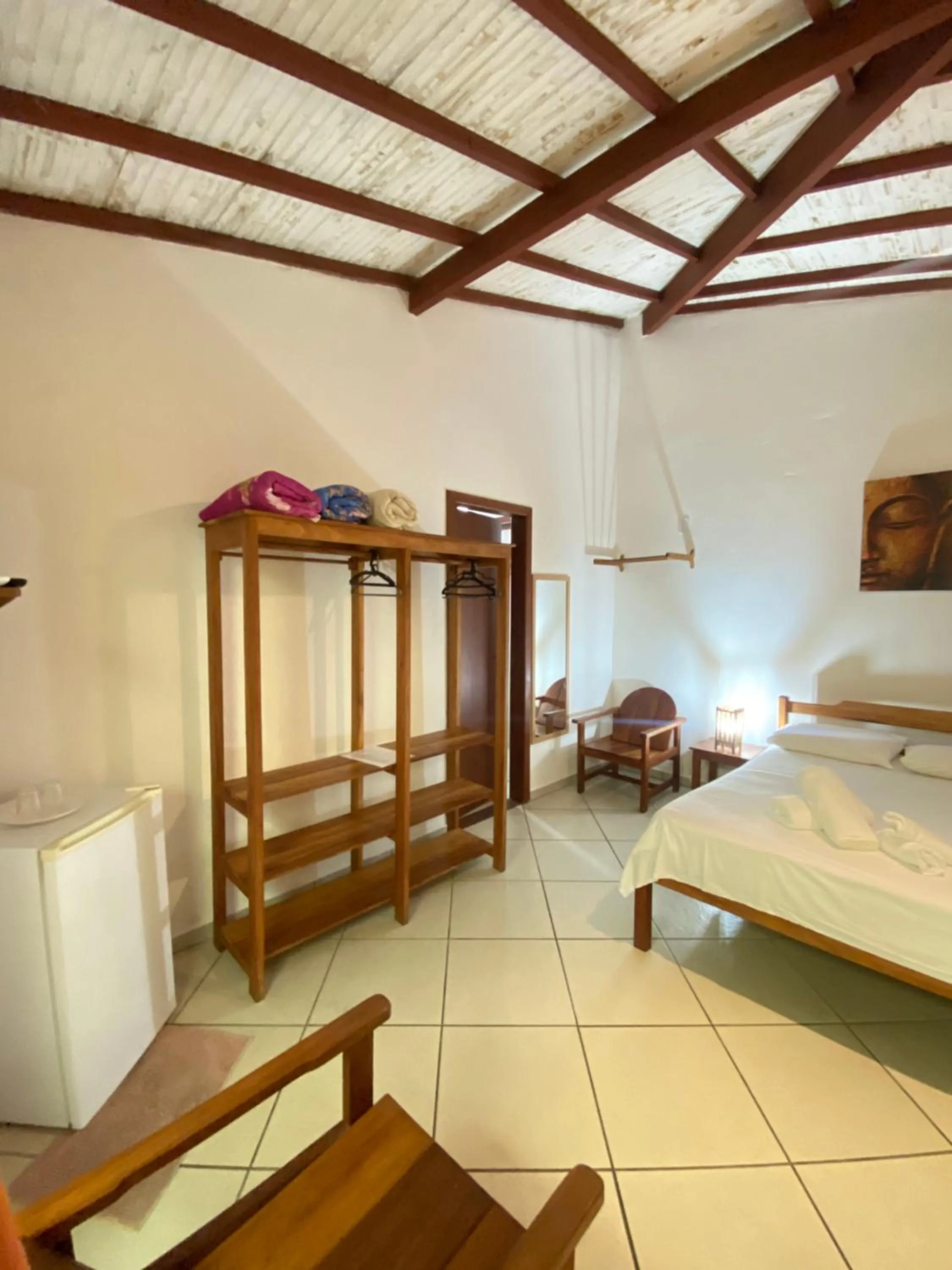 Bed in Pousada Arraial Suites