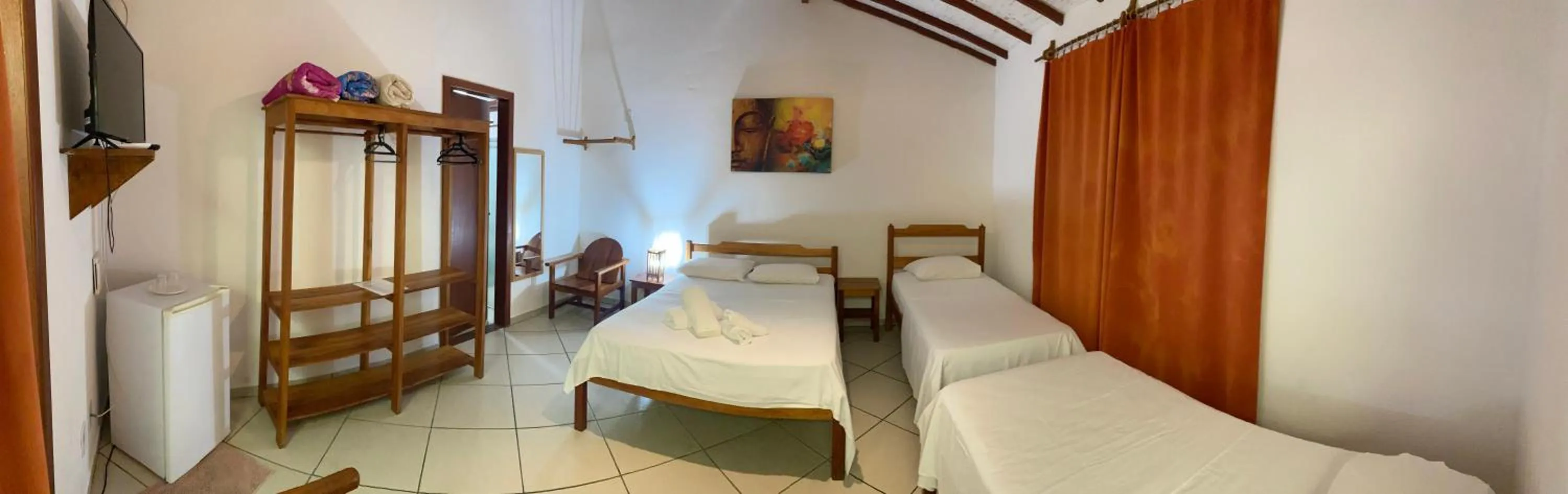 Bed in Pousada Arraial Suites