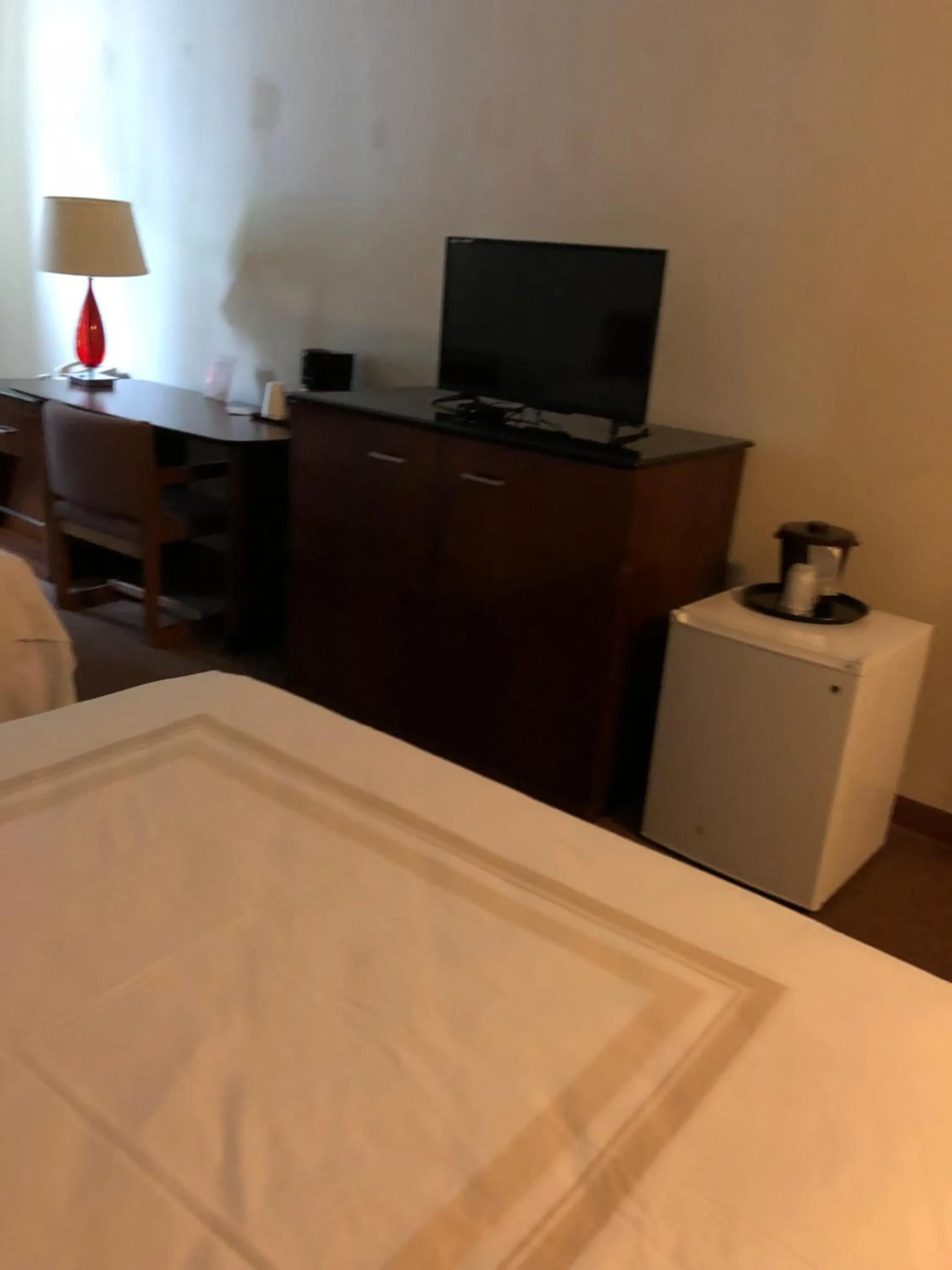 Bed in Coronado Motel & RV Park