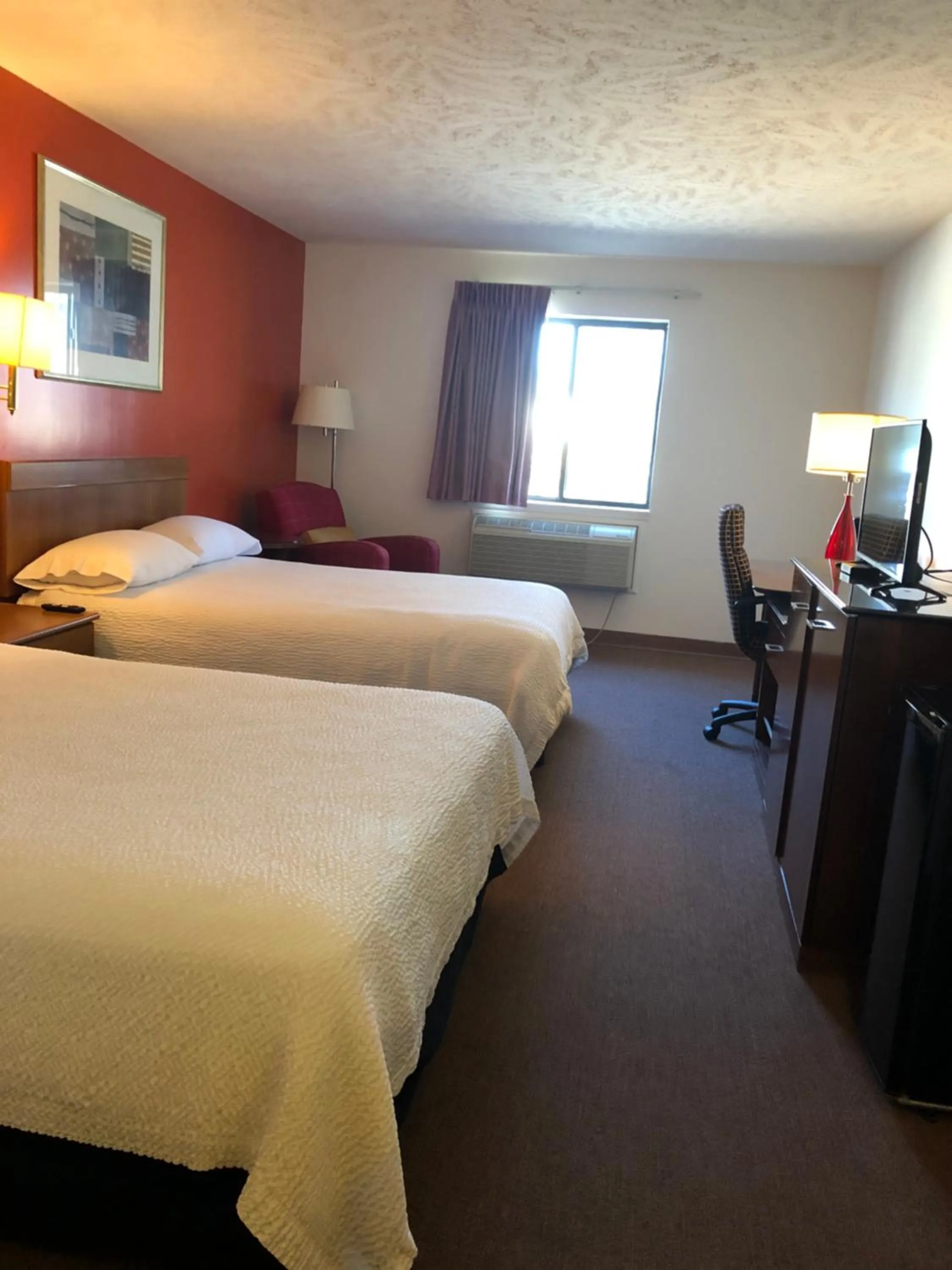 Bed in Coronado Motel & RV Park