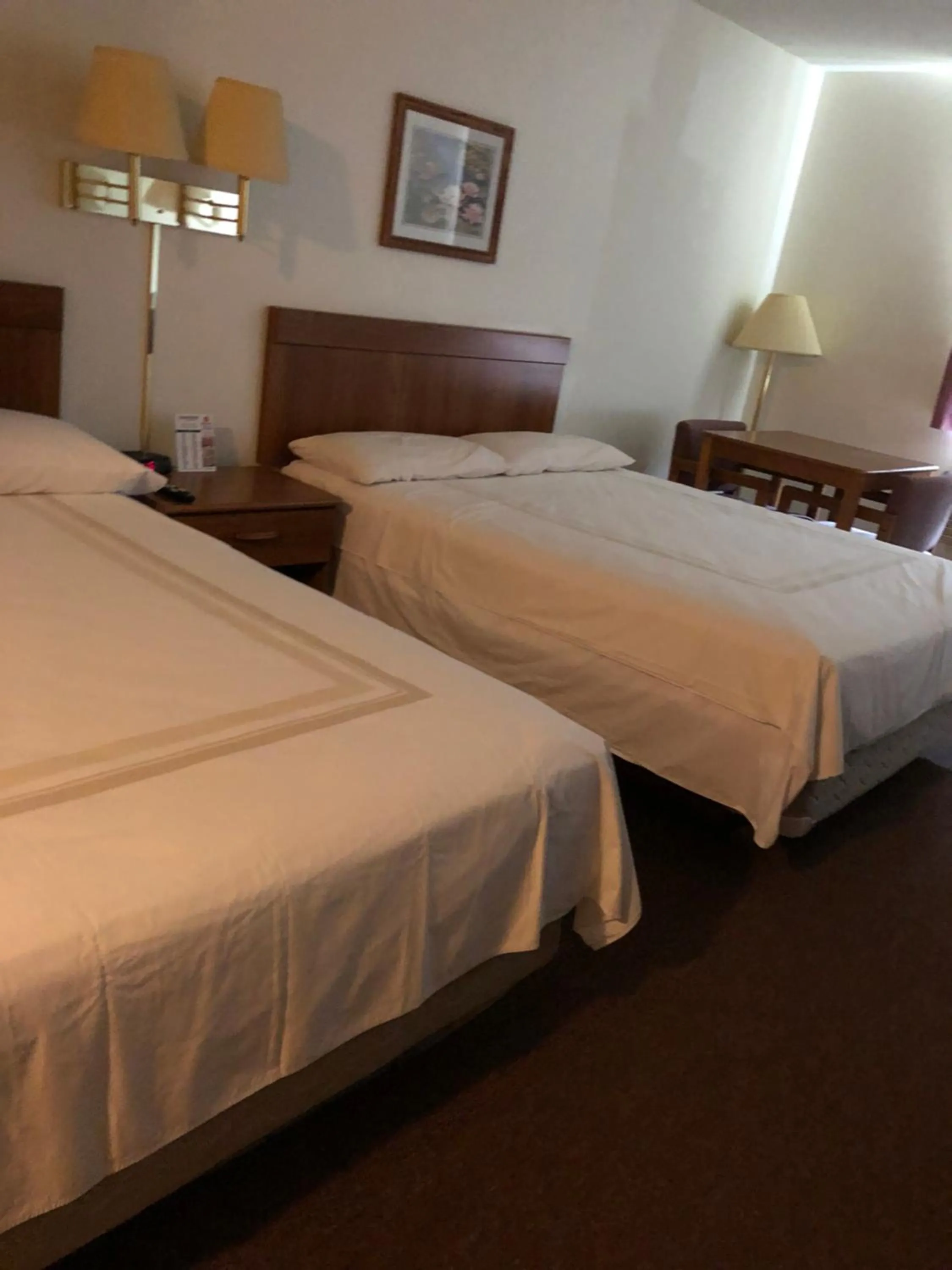 Bed in Coronado Motel & RV Park