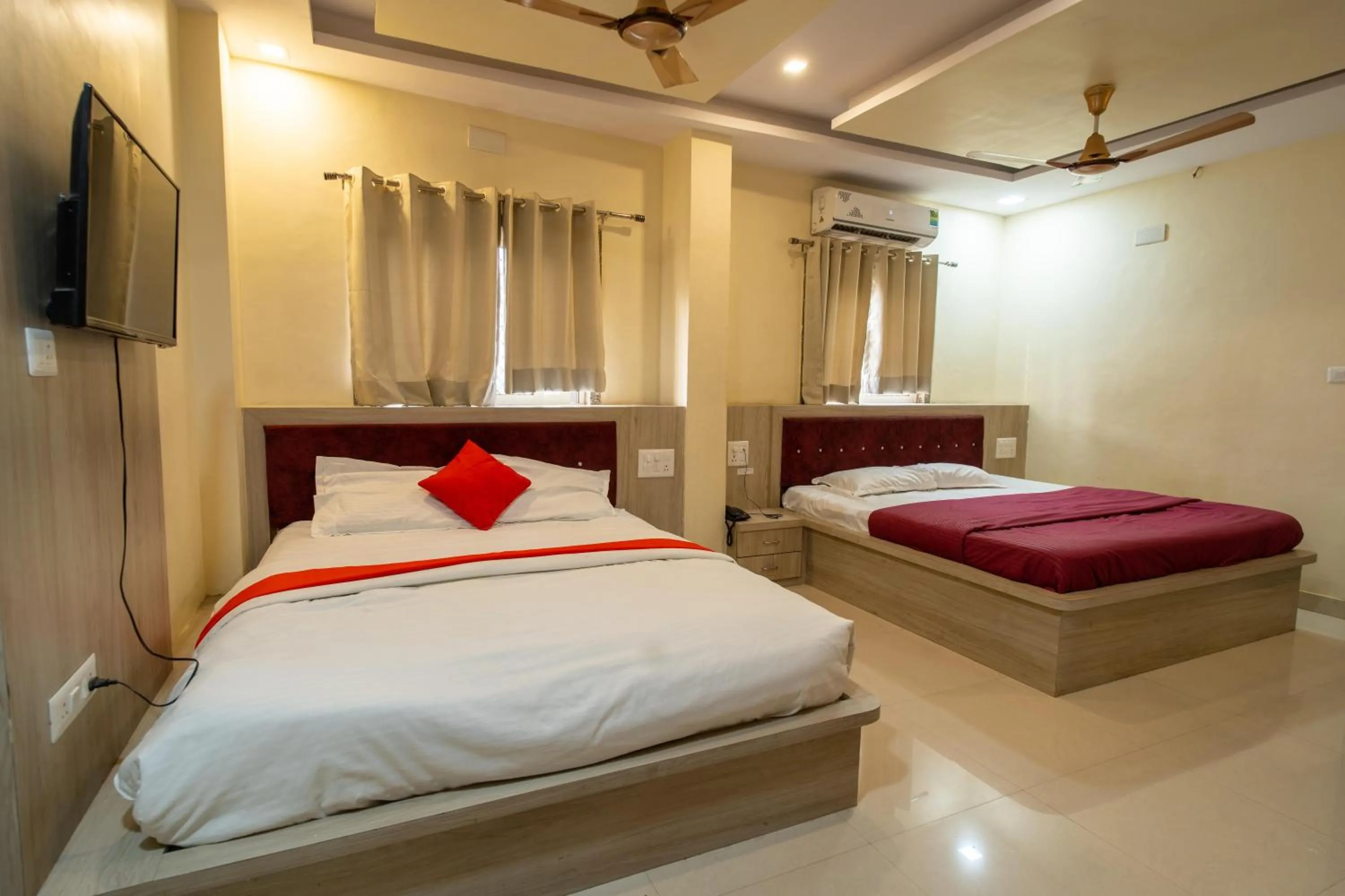 Bed in Majestic Hotel and Restro