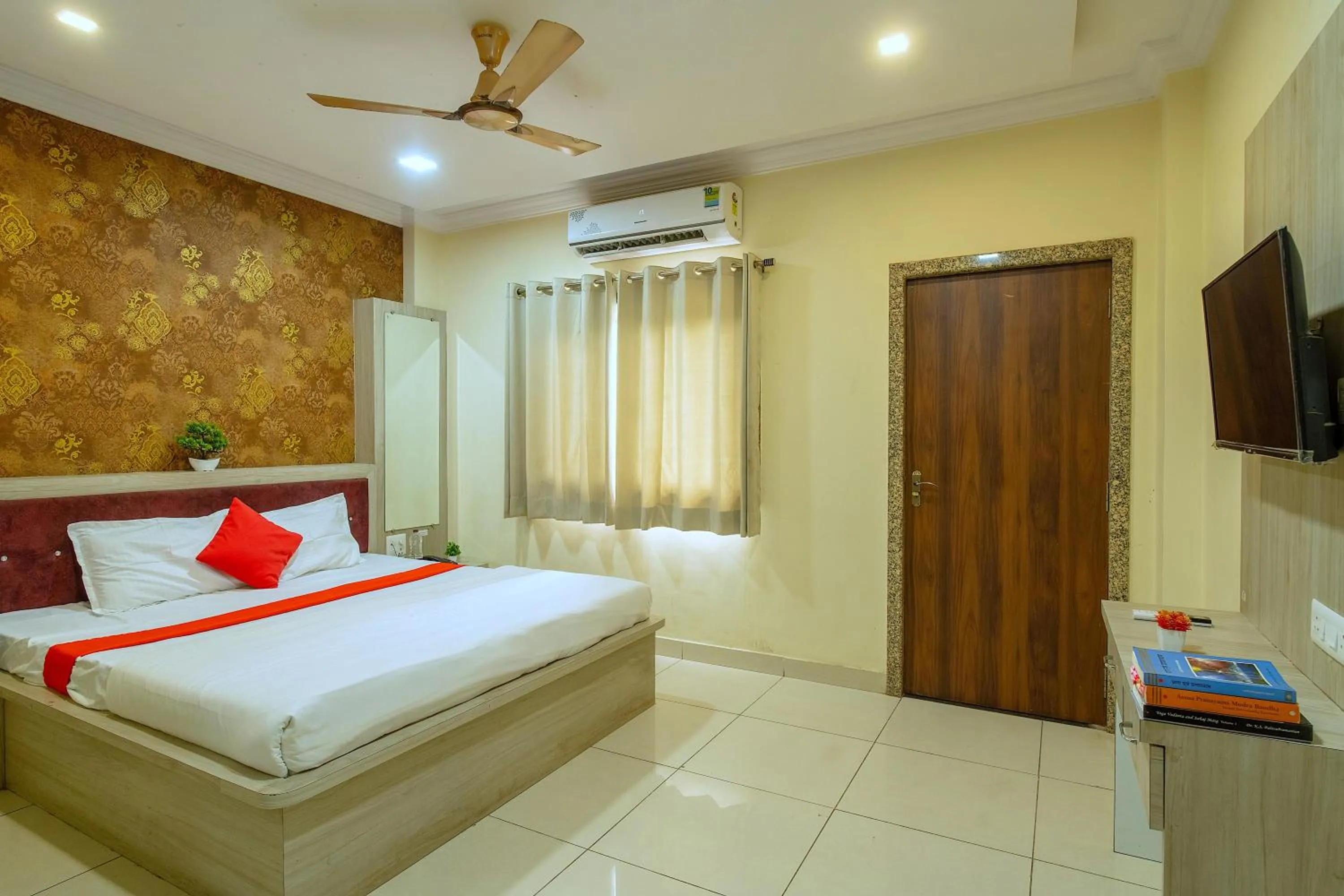 Bed in Majestic Hotel and Restro