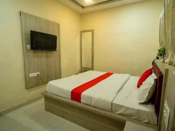 Bed in Majestic Hotel and Restro