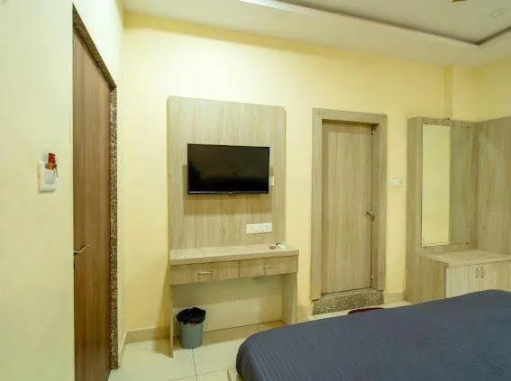 Bed in Majestic Hotel and Restro