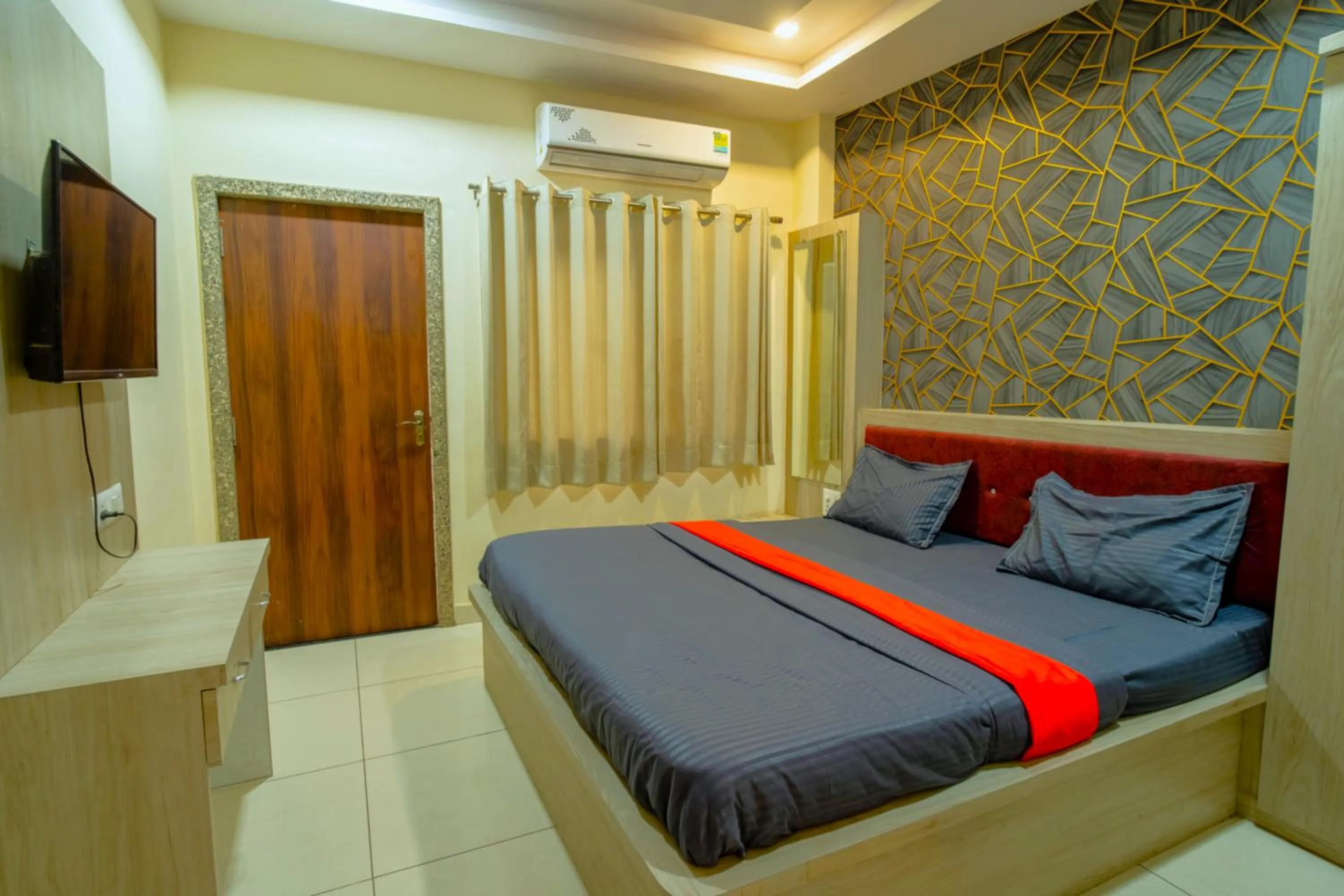 Bed in Majestic Hotel and Restro