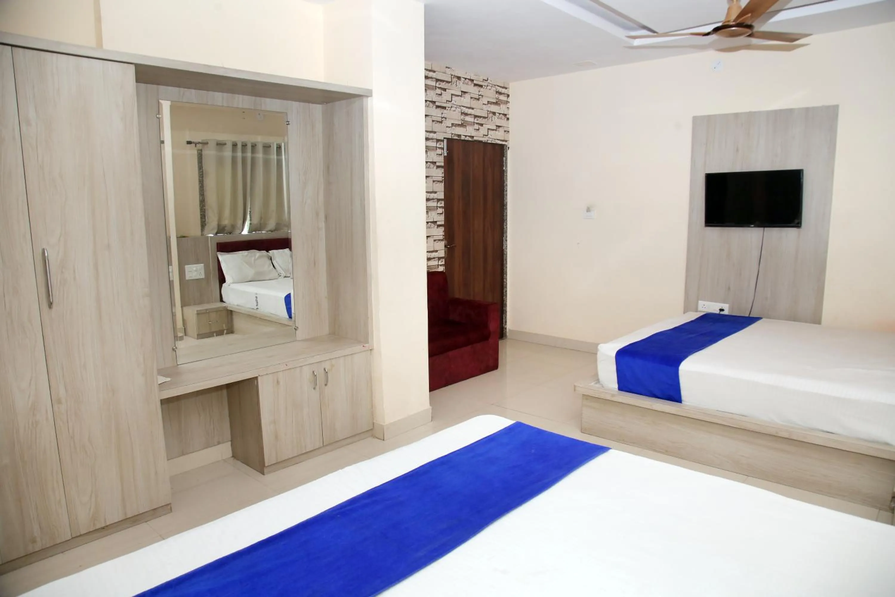 Bed in Majestic Hotel and Restro