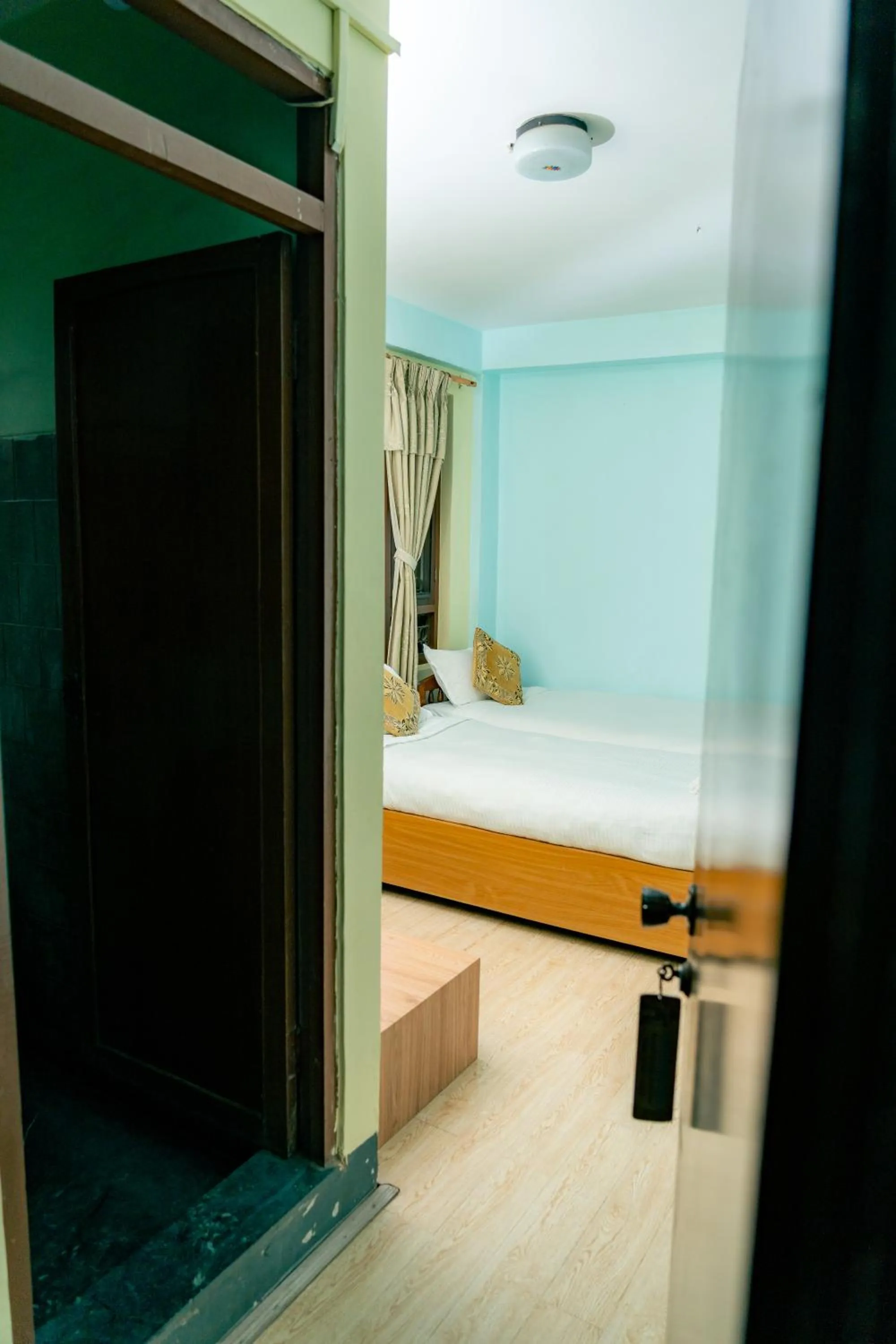 Bed in Golden Gate Guest House