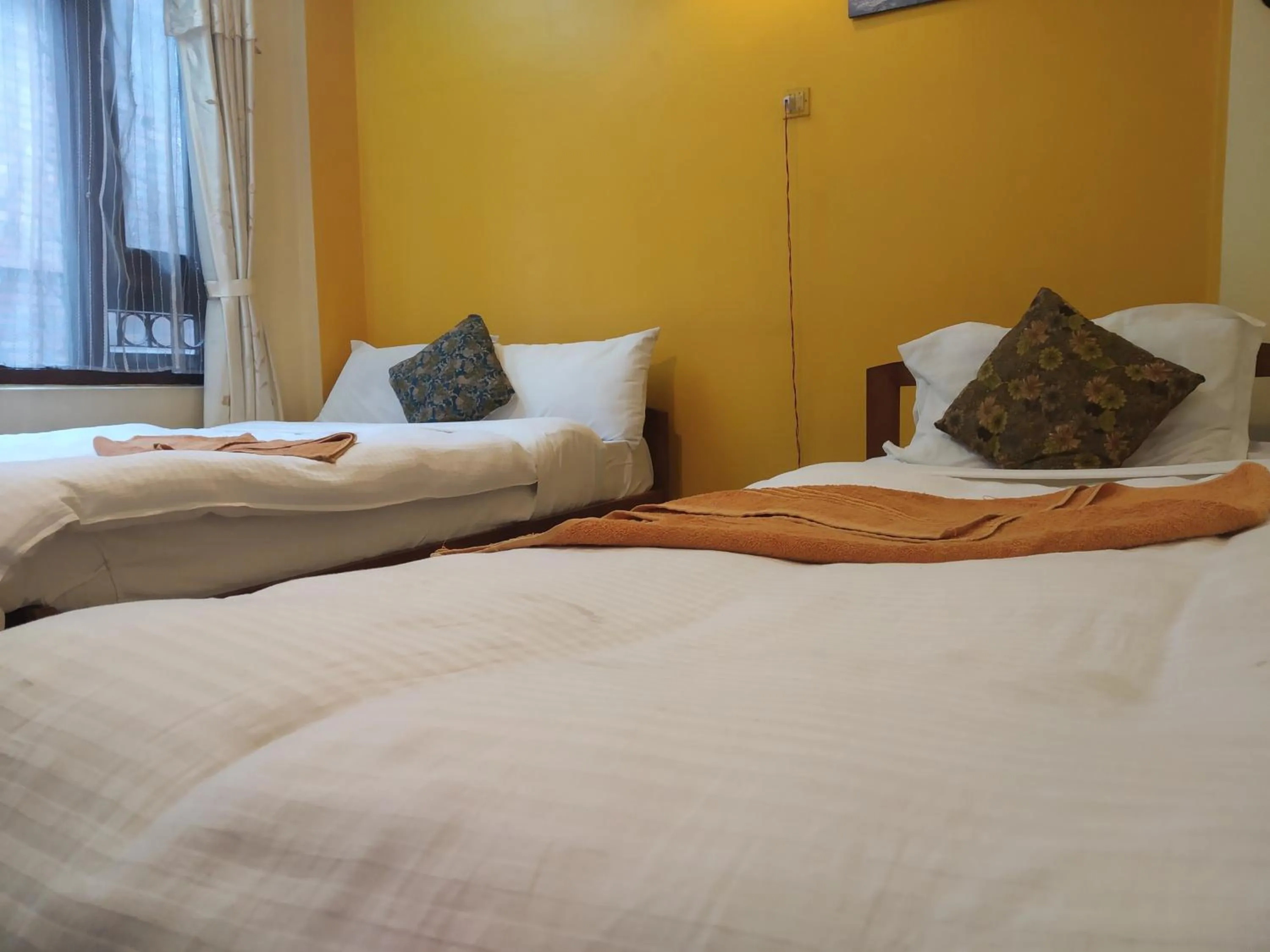 Bed in Golden Gate Guest House