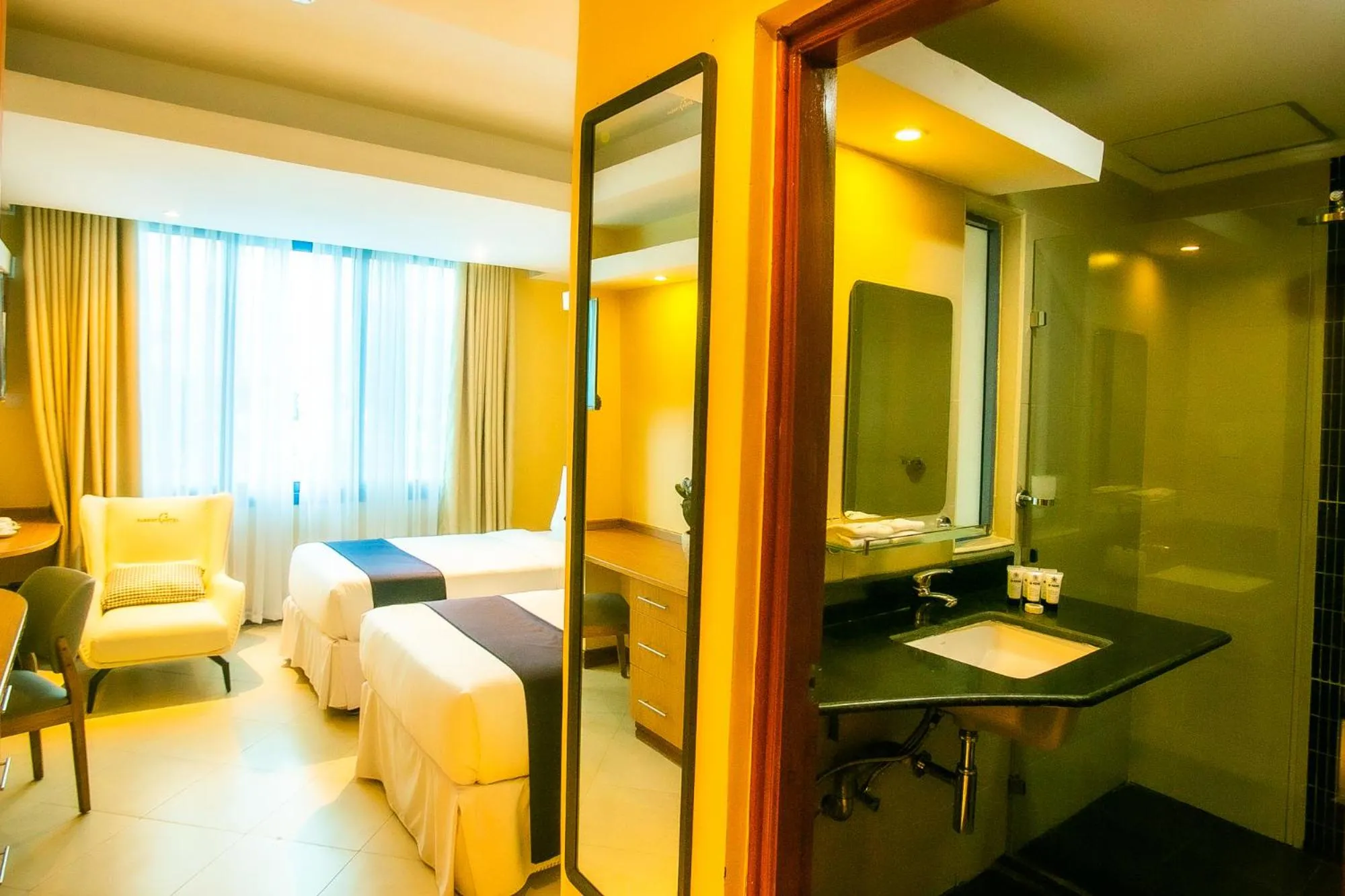 Bed in Parrot Hotel Arusha