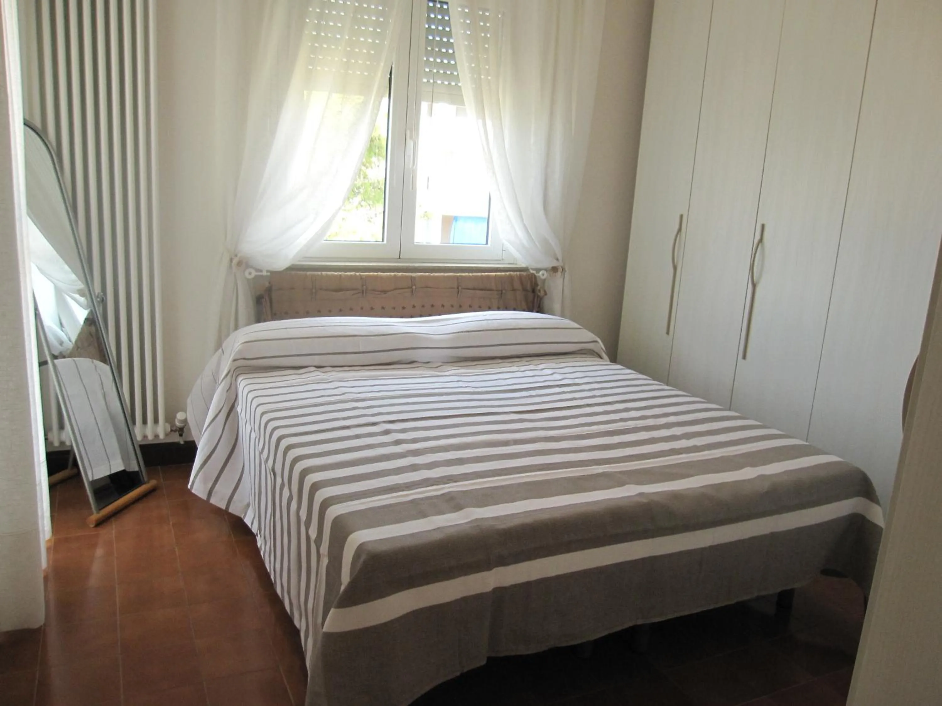 Bed in Appartamento Due Stelle